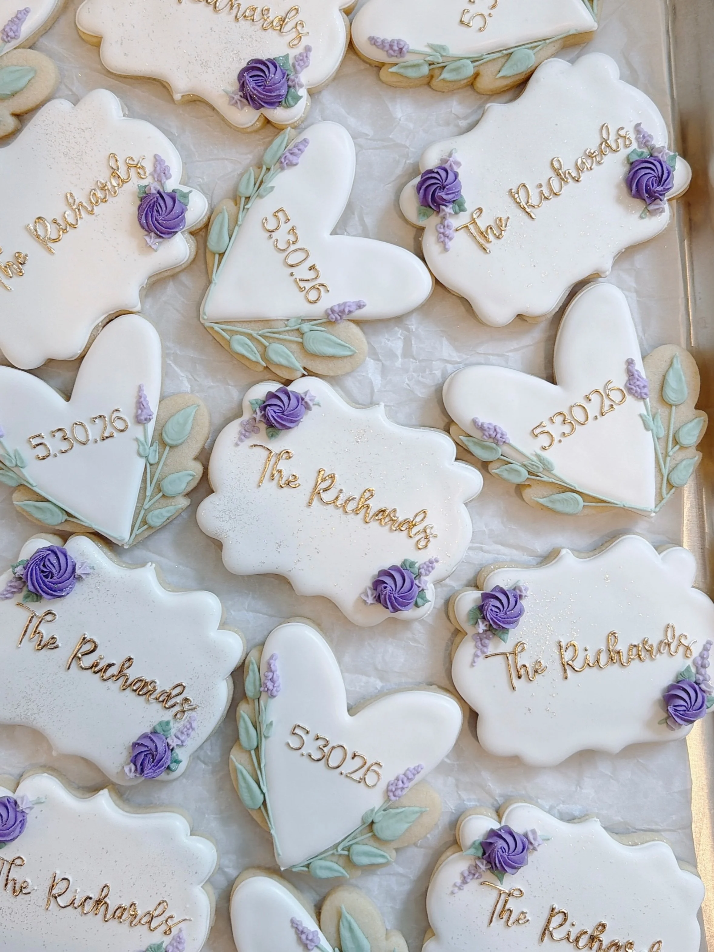 Congrats to the newly weds! 💜

✨Cutters are tagged✨

#bridalcookies #weddingcookies #prettycookies #decoratedcookiesofinstagram #sugarcookies