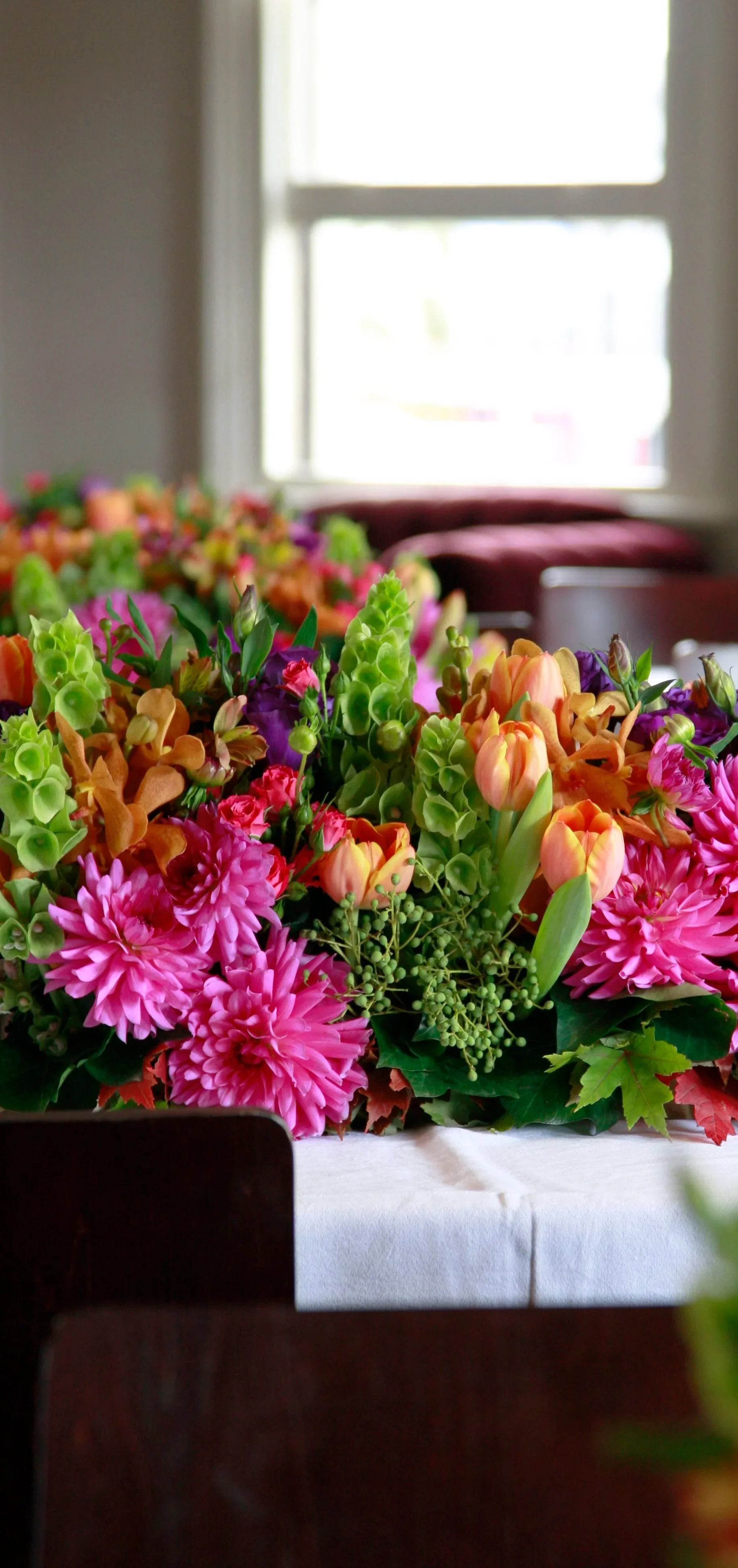 Long & Low Table Arrangements in Bright Colours