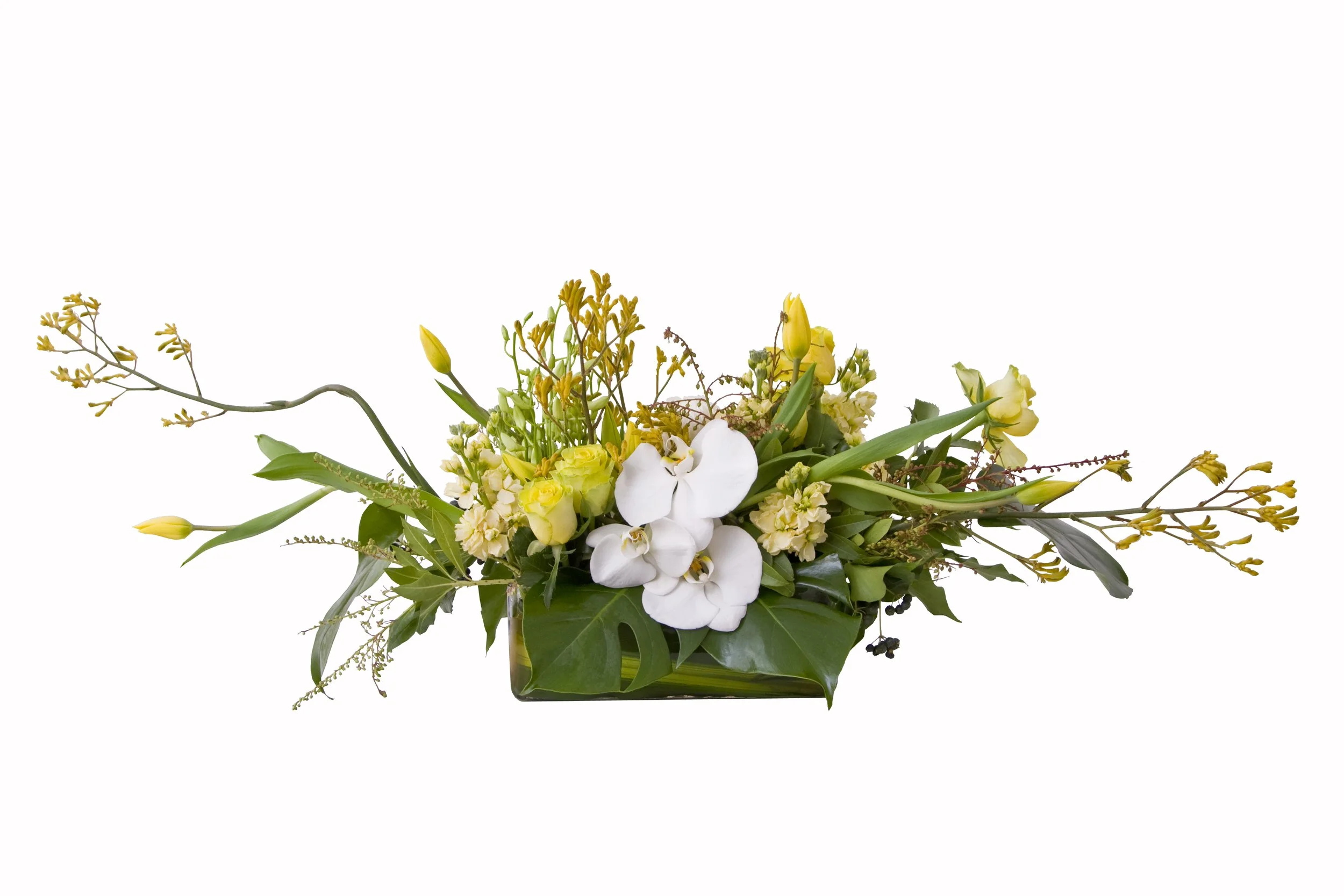 Long and low floral centrepieces for boardroom tables. Melbourne office flowers ideas & inspiration. Botanic Flowers 1300 820 920.