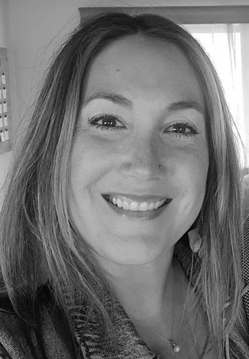 Black and white portrait of Kelsey Machtolf, Benefit Manager.