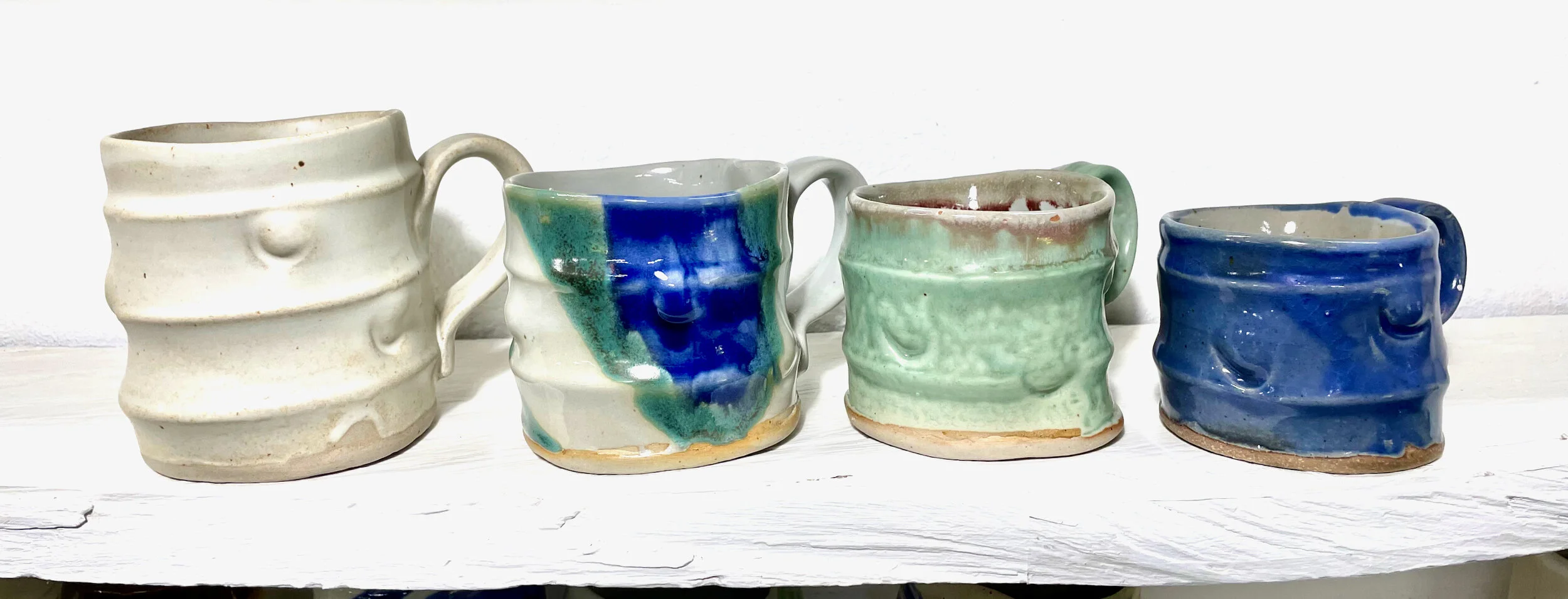 Mug, S $20, M $23, Lg $26, XL $30 (Huge $36)