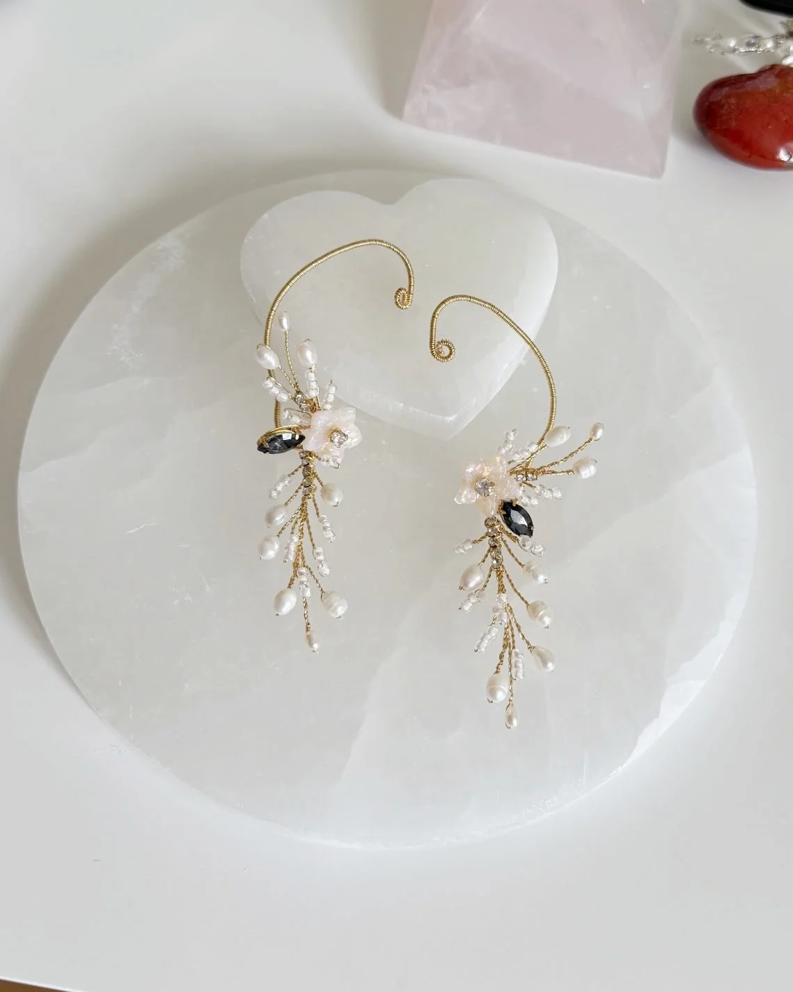 This unique cuff earring was created as a custom order, tailored specifically to reflect the client&rsquo;s personal style and vision. Crafted entirely by hand, it hugs the ear without the need for a piercing, offering both comfort and bold elegance.