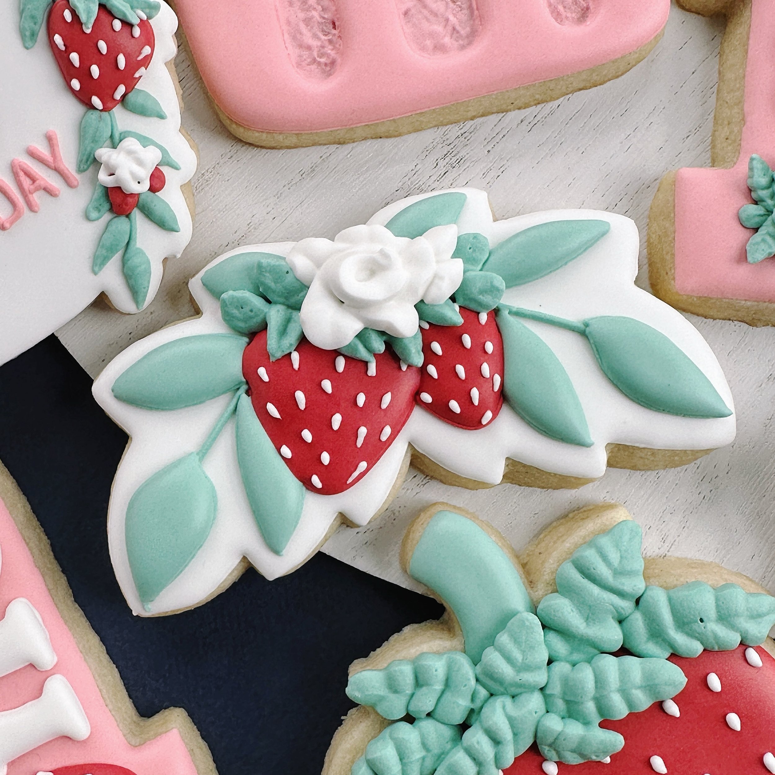 I&rsquo;ll never tire of fruit and leaves on this shape 🍓❤️

#strawberrycookies #atlantacookies #customcookiesatlanta #atlantacookier #atlantacustomcookies #atlcookies  #cookiesatl #customcookies #decoratedcookies #customsugarcookies #royalicingcook