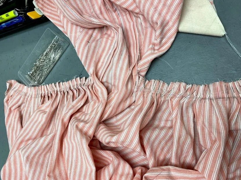 The back panel of a Robe A L'anglaise is traditionally cut as one piece with the skirt