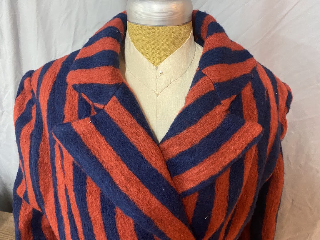 A close up of the front collar and lapel