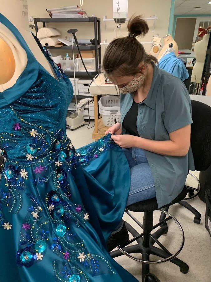 A photo of me handstitching applique!