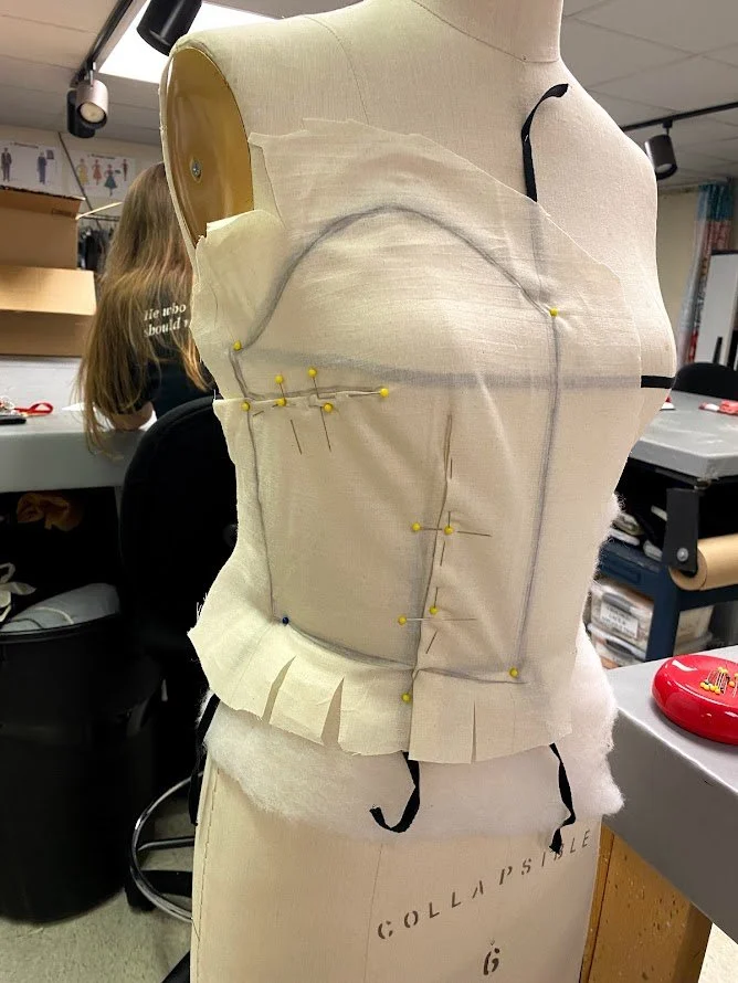 Muslin bodice draped on the form with a sweetheart neckline