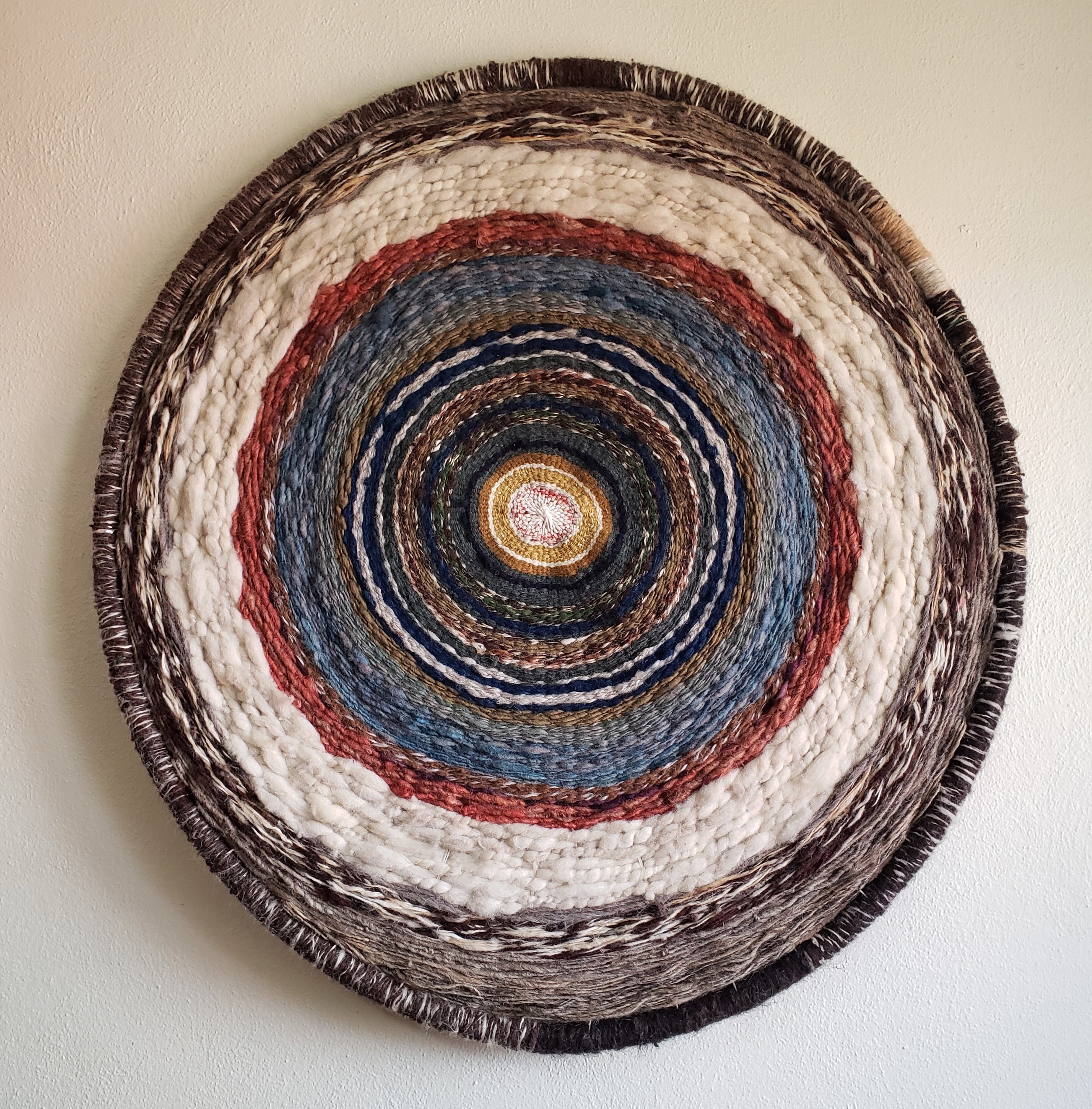 EARTH, 2023, natural dyed, handspun wool, cotton warp, 32" diameter