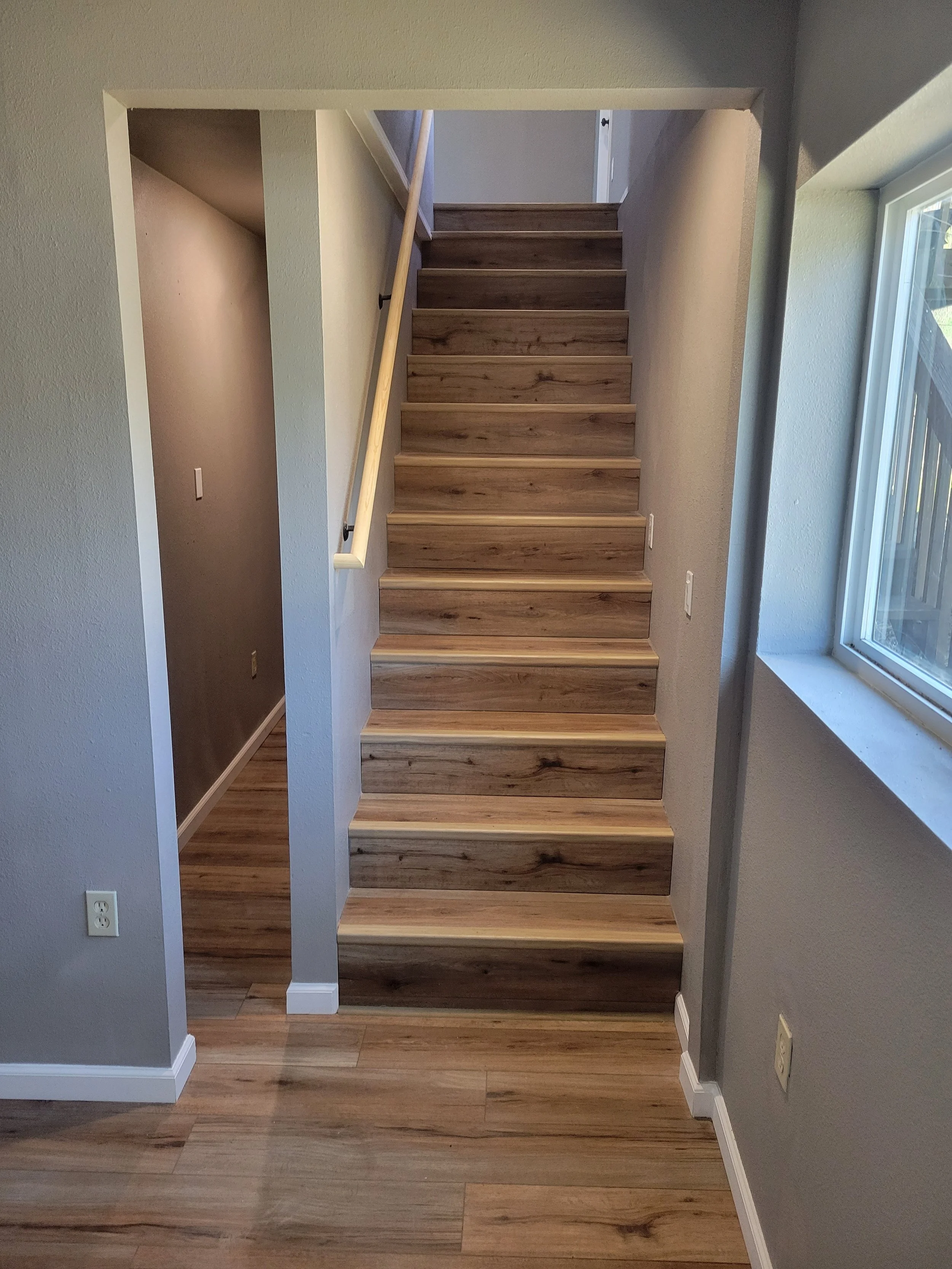 Conversions - Added stairwell through ceiling and finish attic space