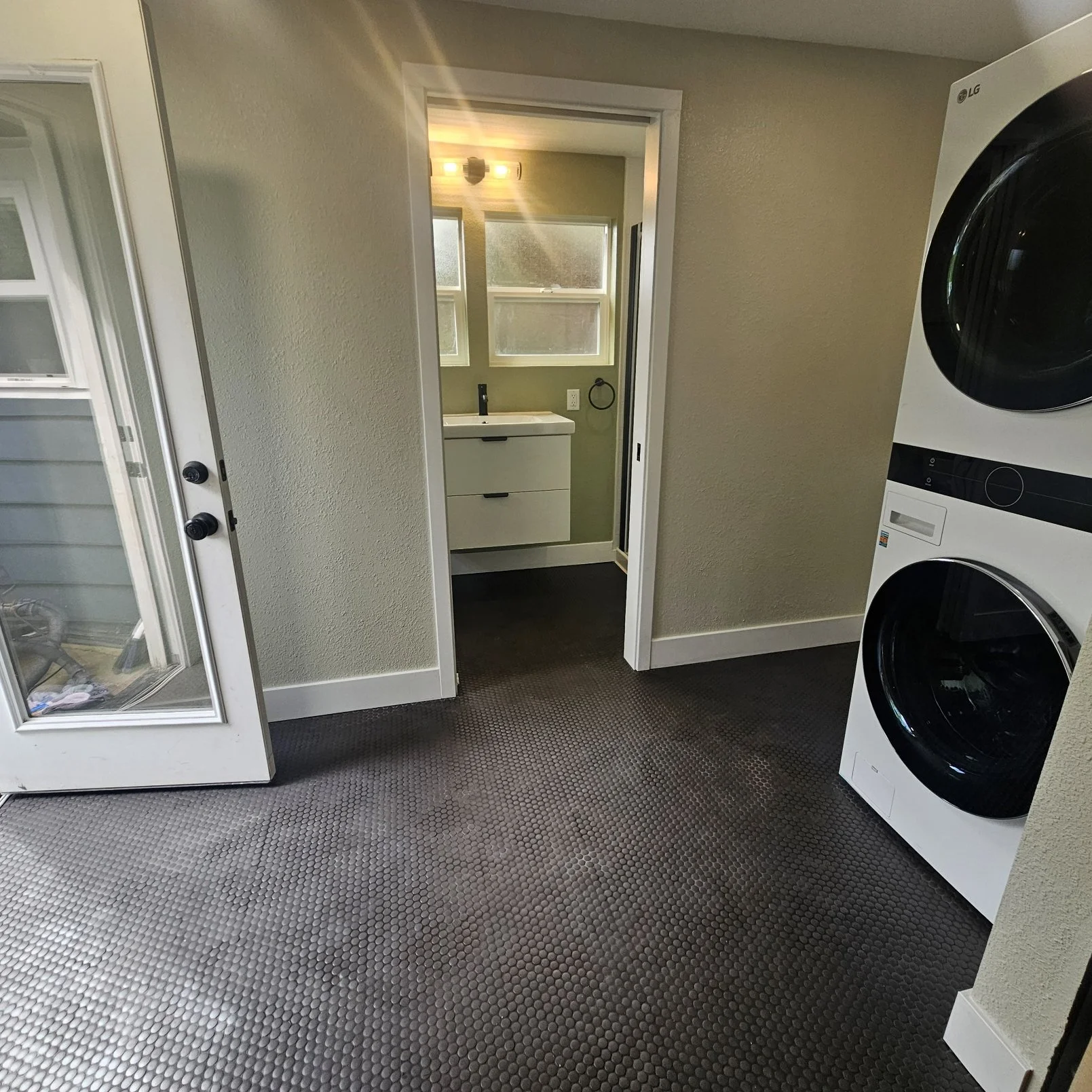 Permit to divide laundry/storage room and create full bathroom 1