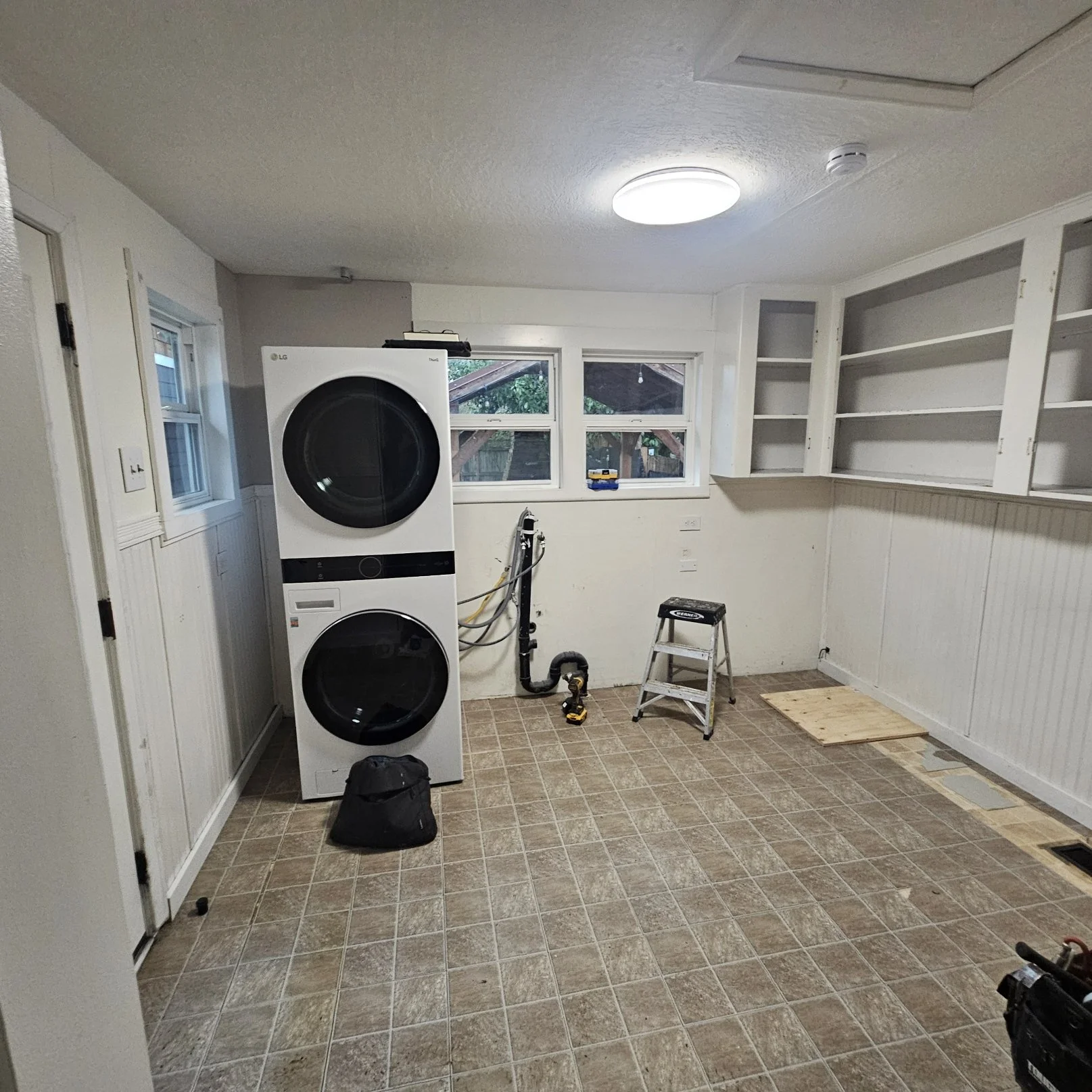 before Permit to divide laundry/storage room and create full bathroom