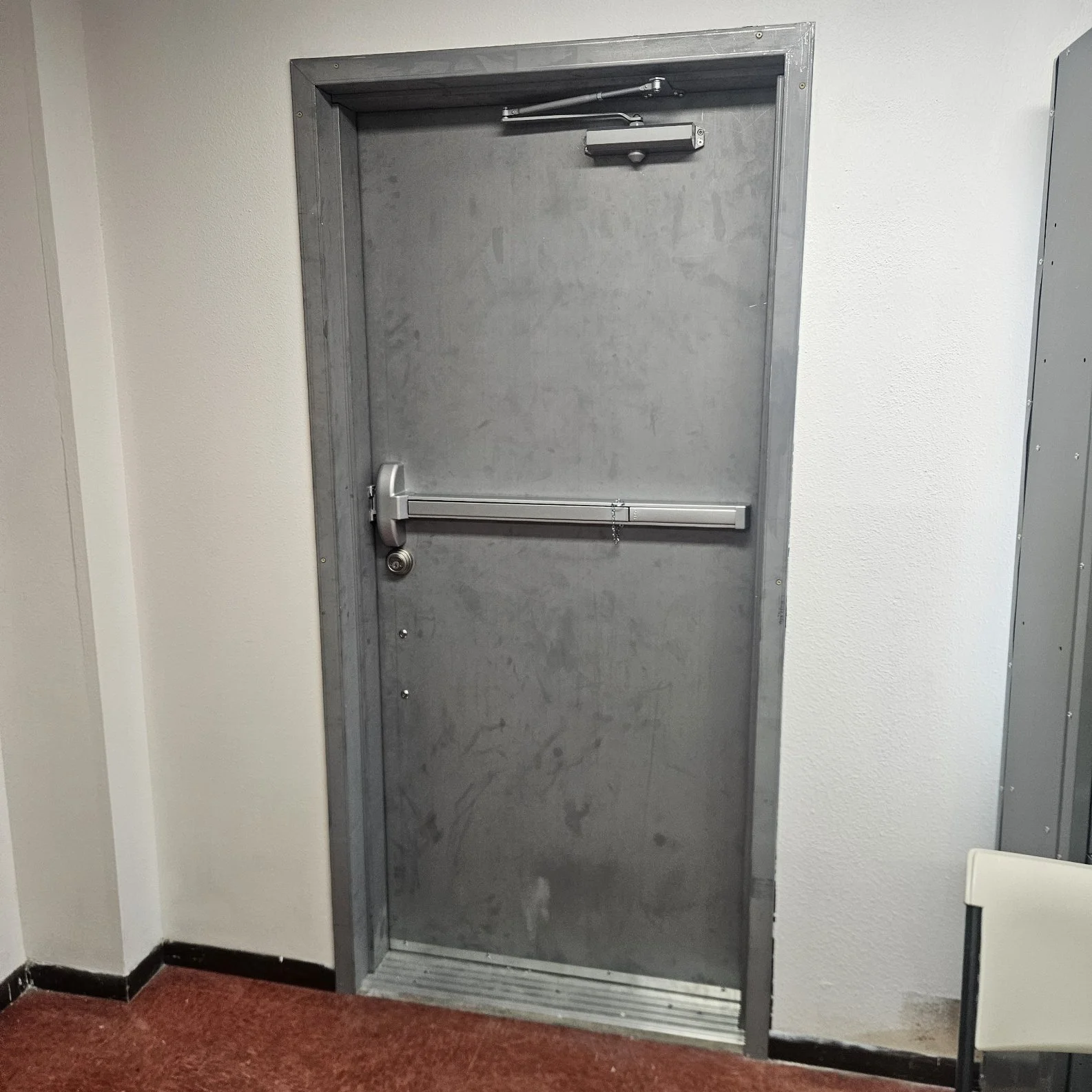 Permit to add exterior fire door with panic bar
