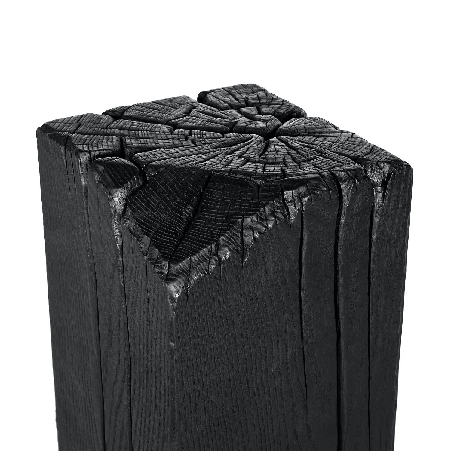 A close-up image of a black charred wooden post with visible cracks and burnt surface, isolated on a white background.