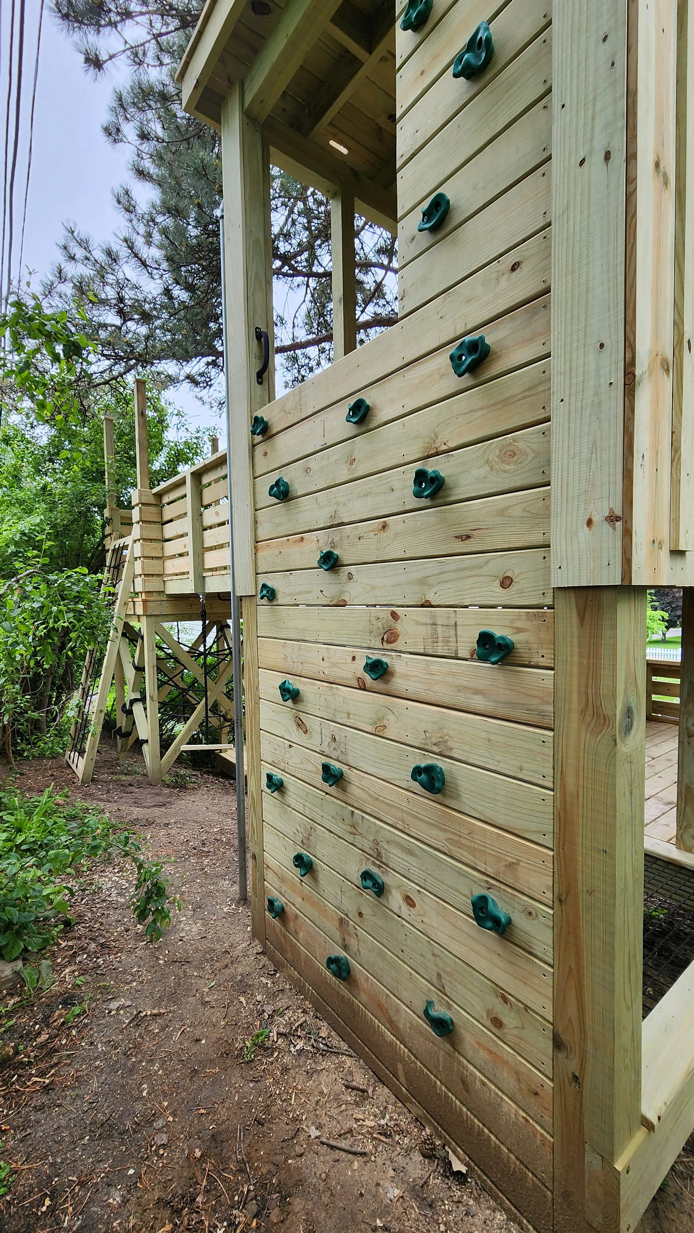 tree-fort-rock-wall-green-holds-into-clubhouse.jpg