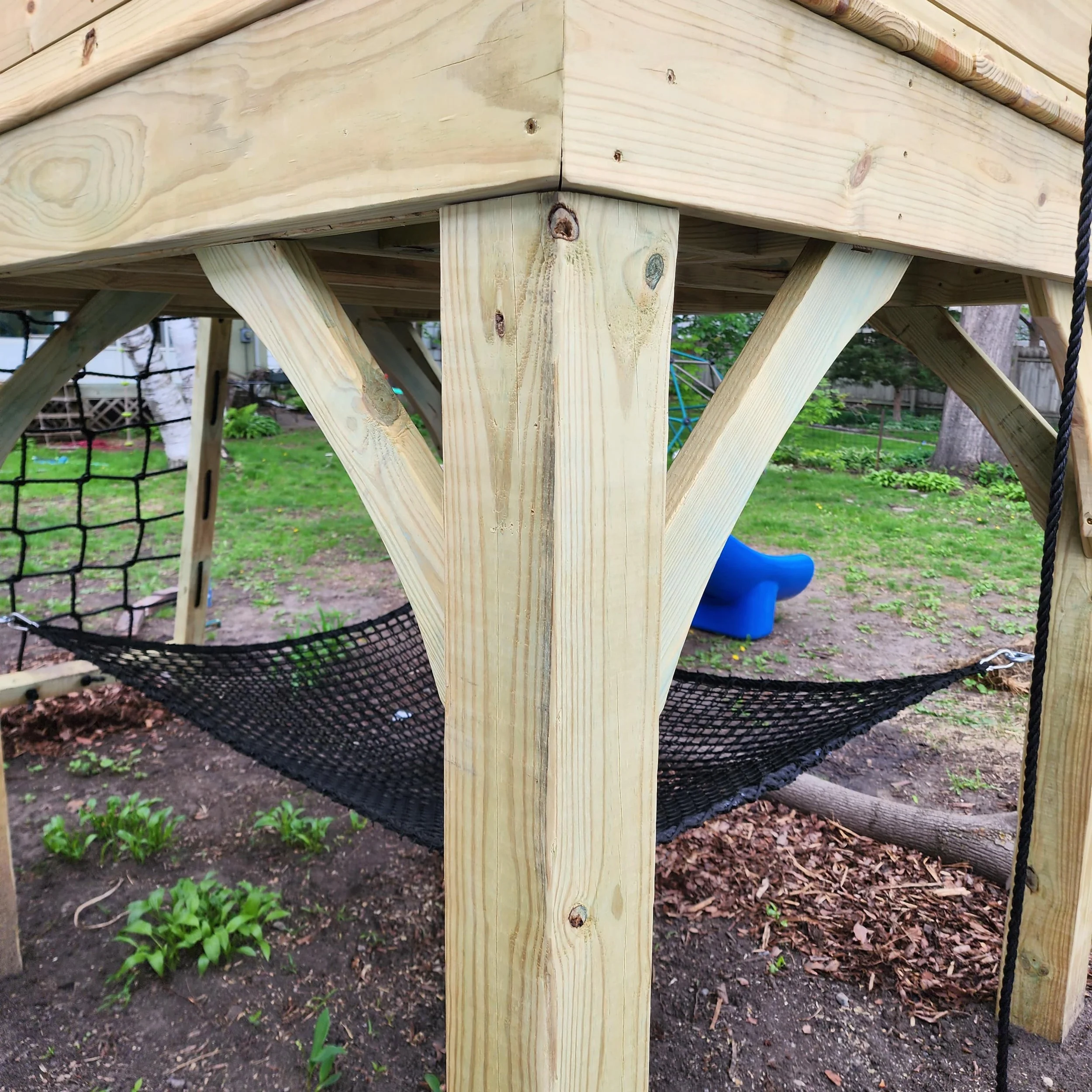 custom play structure support with curved knee braces