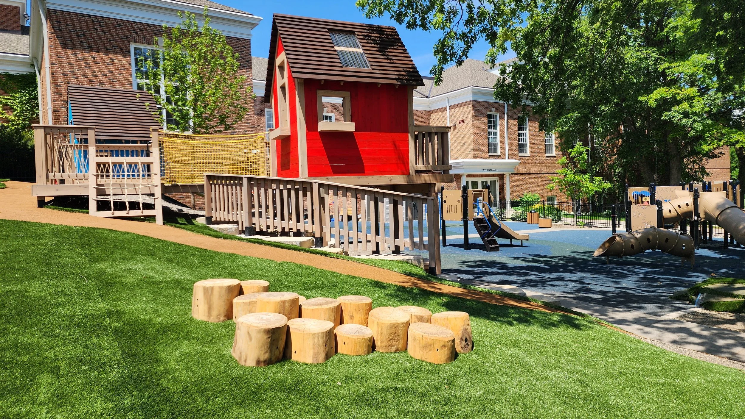 red-play-house-log-stumps.jpg