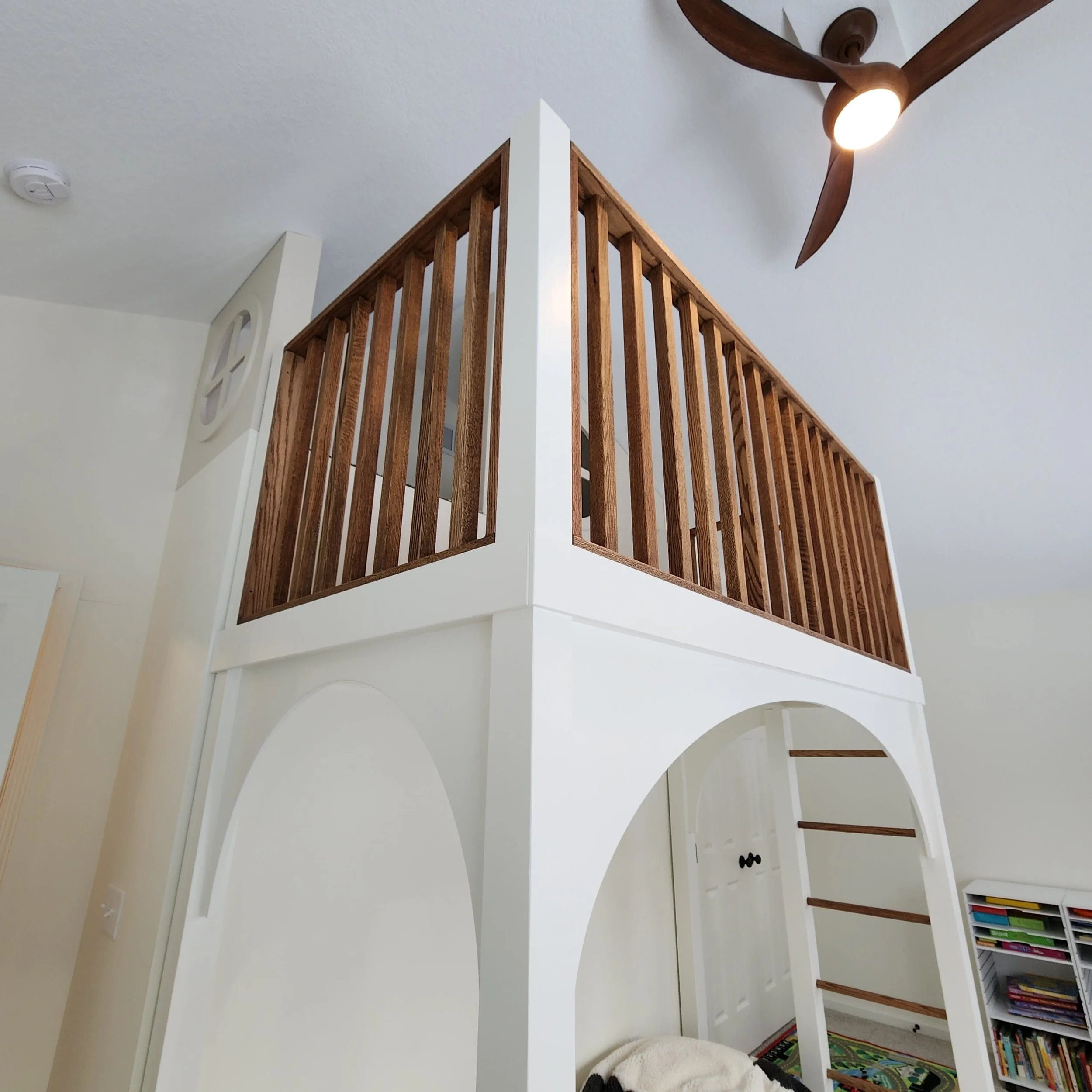 lofted-playroom-cozy-white-oak-railing.jpg