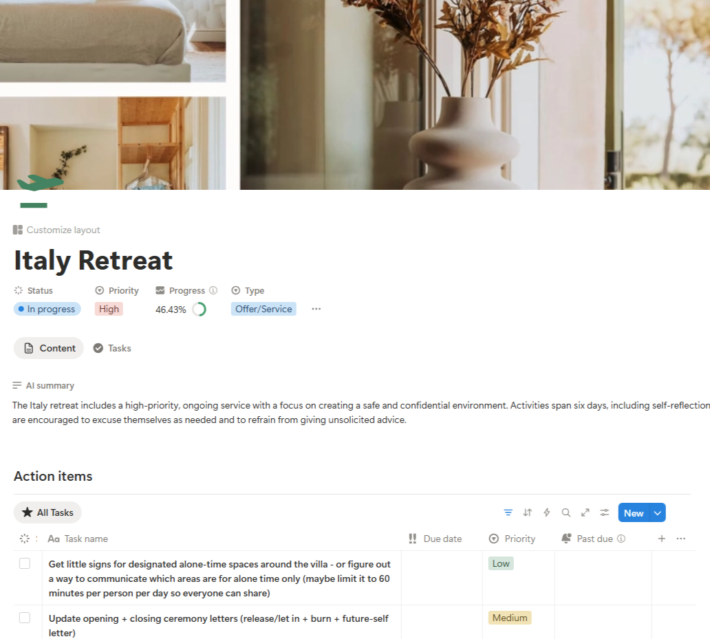 A bright room with a white vase holding dried flowers near a window with trees outside.