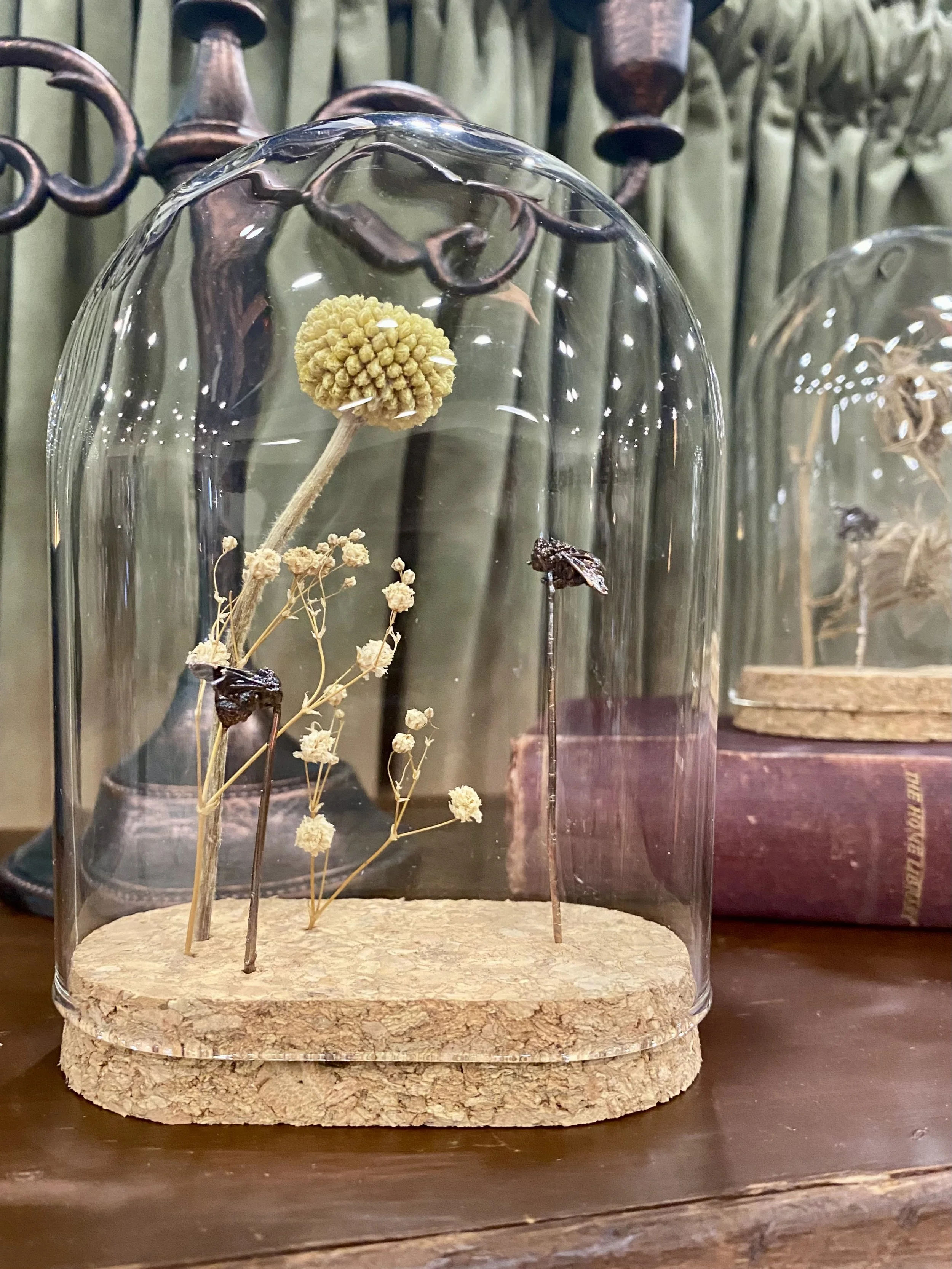 Glass cloche with copper insects
