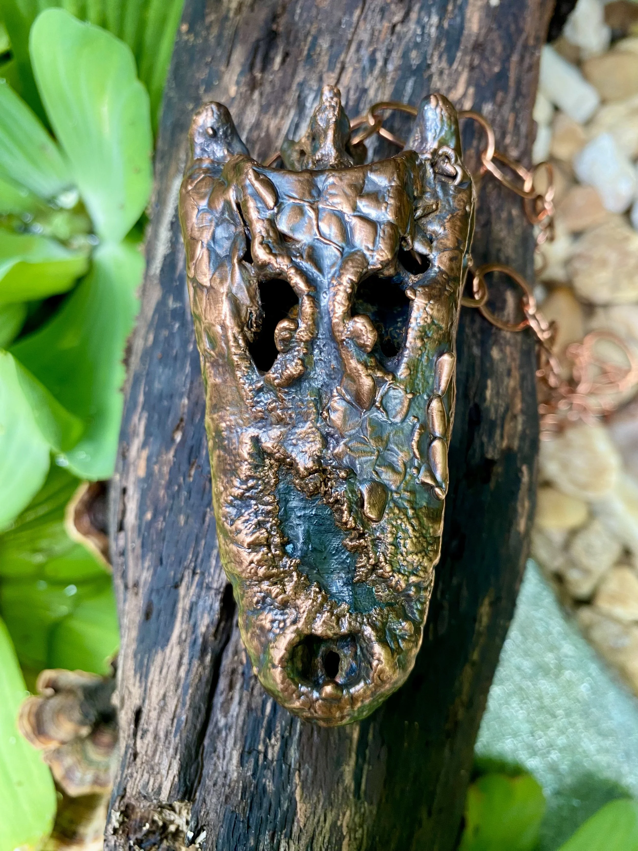 3D printed alligator skull from CT scan, electroformed in copper with snake shed