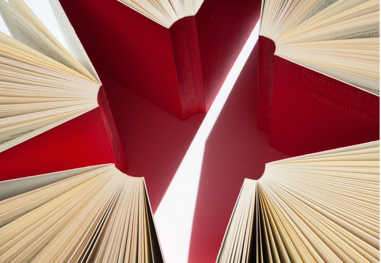 Books make star shape to illustrate learning.