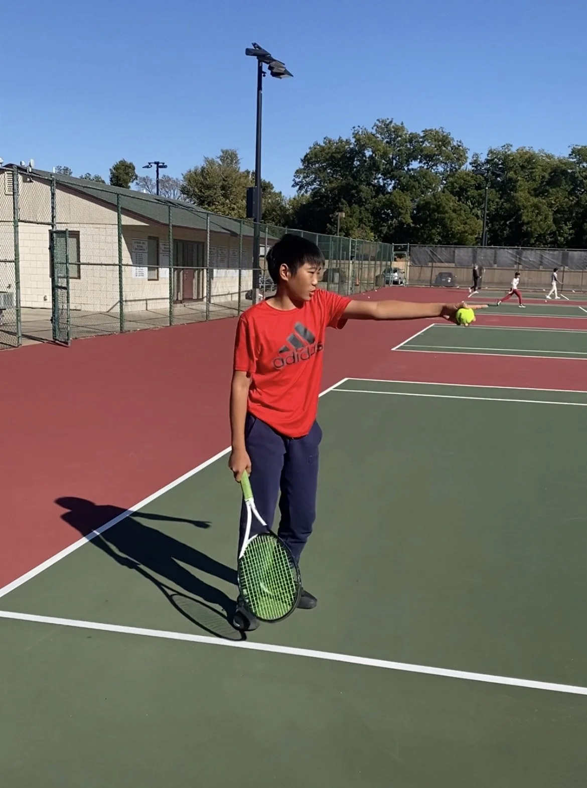 Kevin Chen on the Jenks Tennis Courts  Courtesy of Aiden Acebo