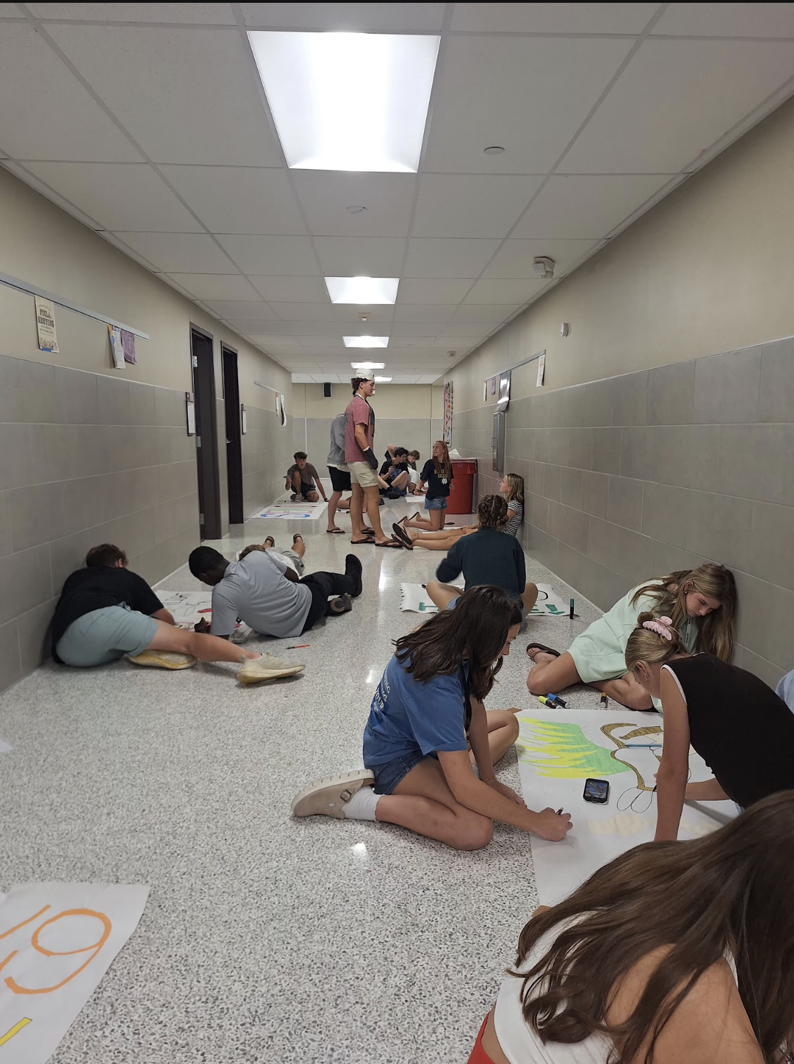Students working on posters