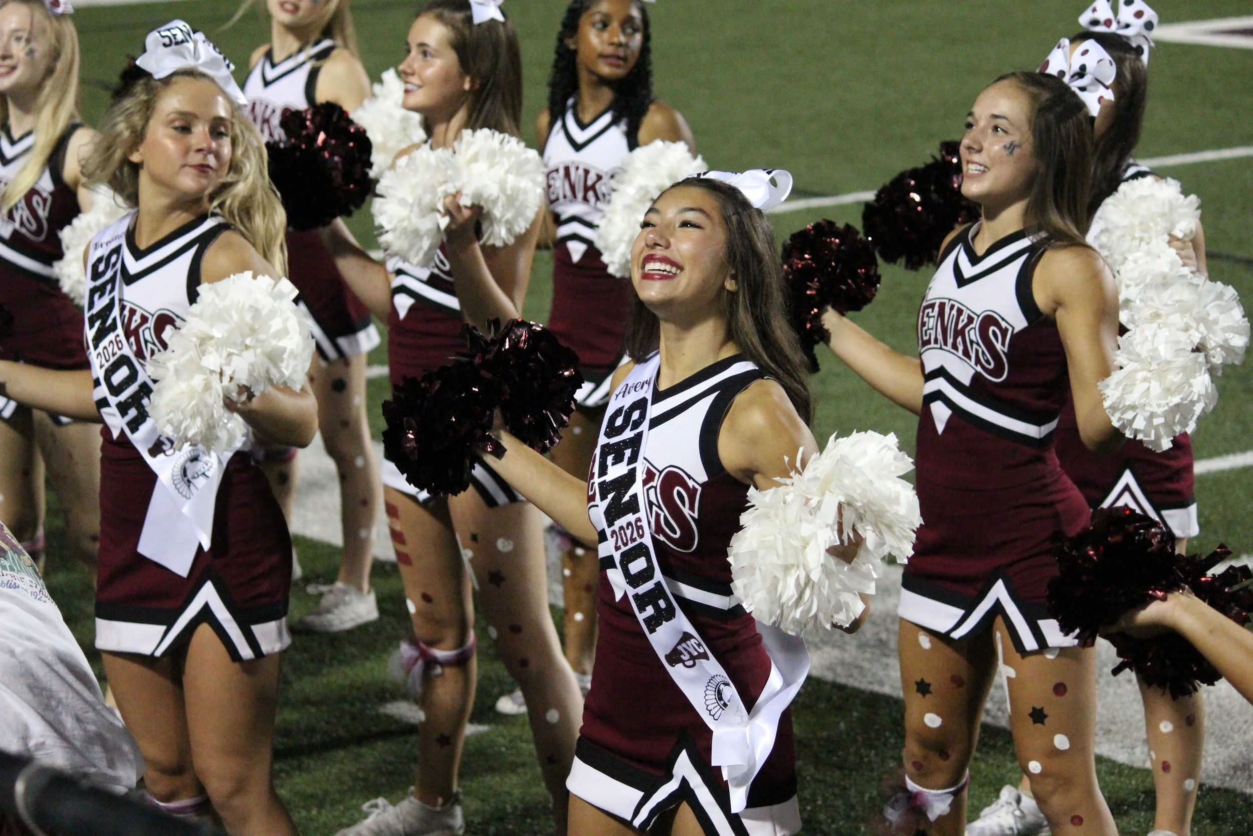 Cheerleader cheering.