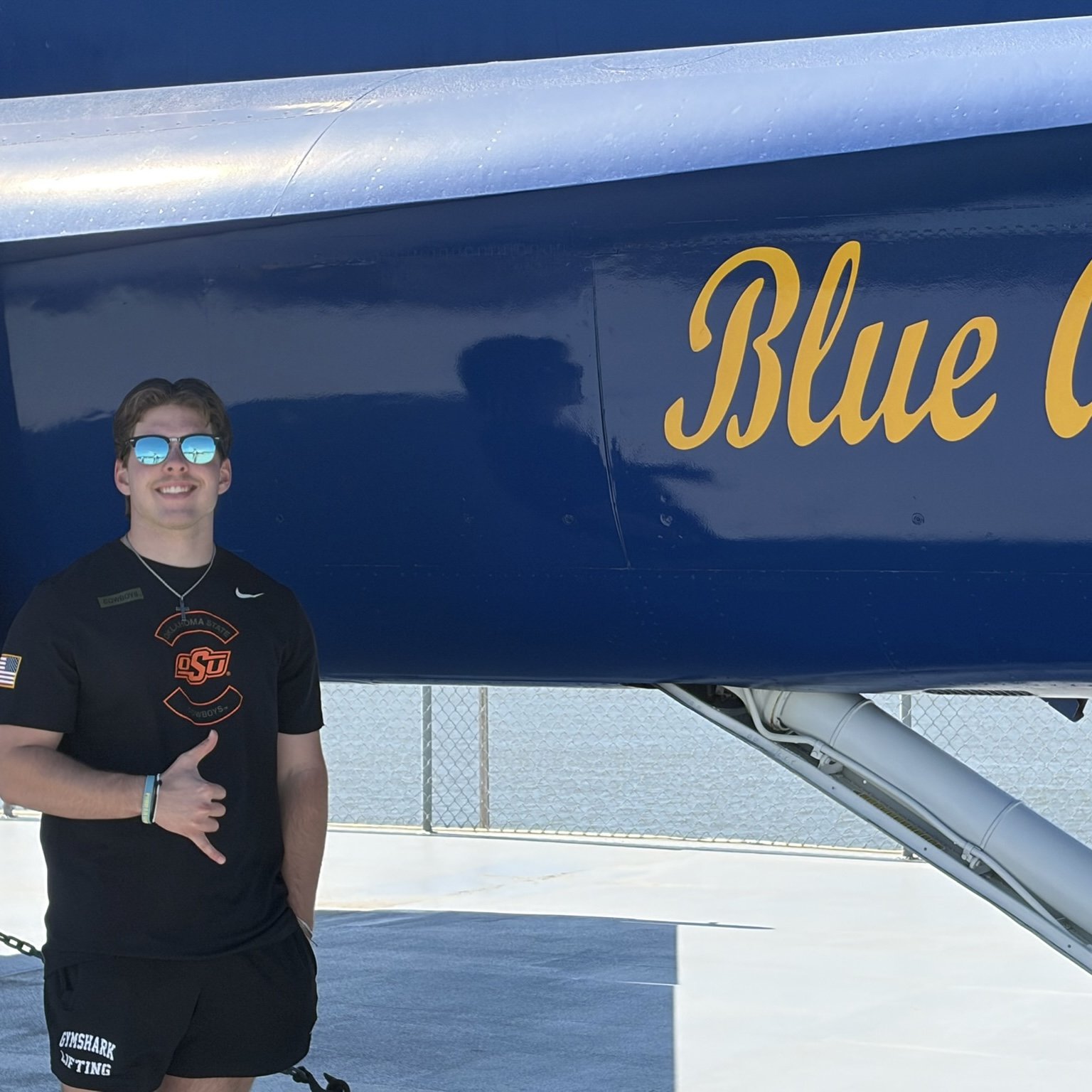 Man standing in front of plane.