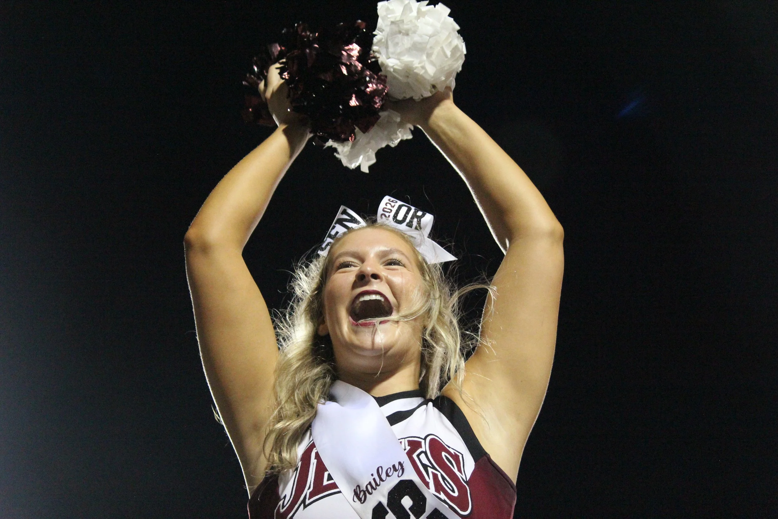 Cheerleader cheering.