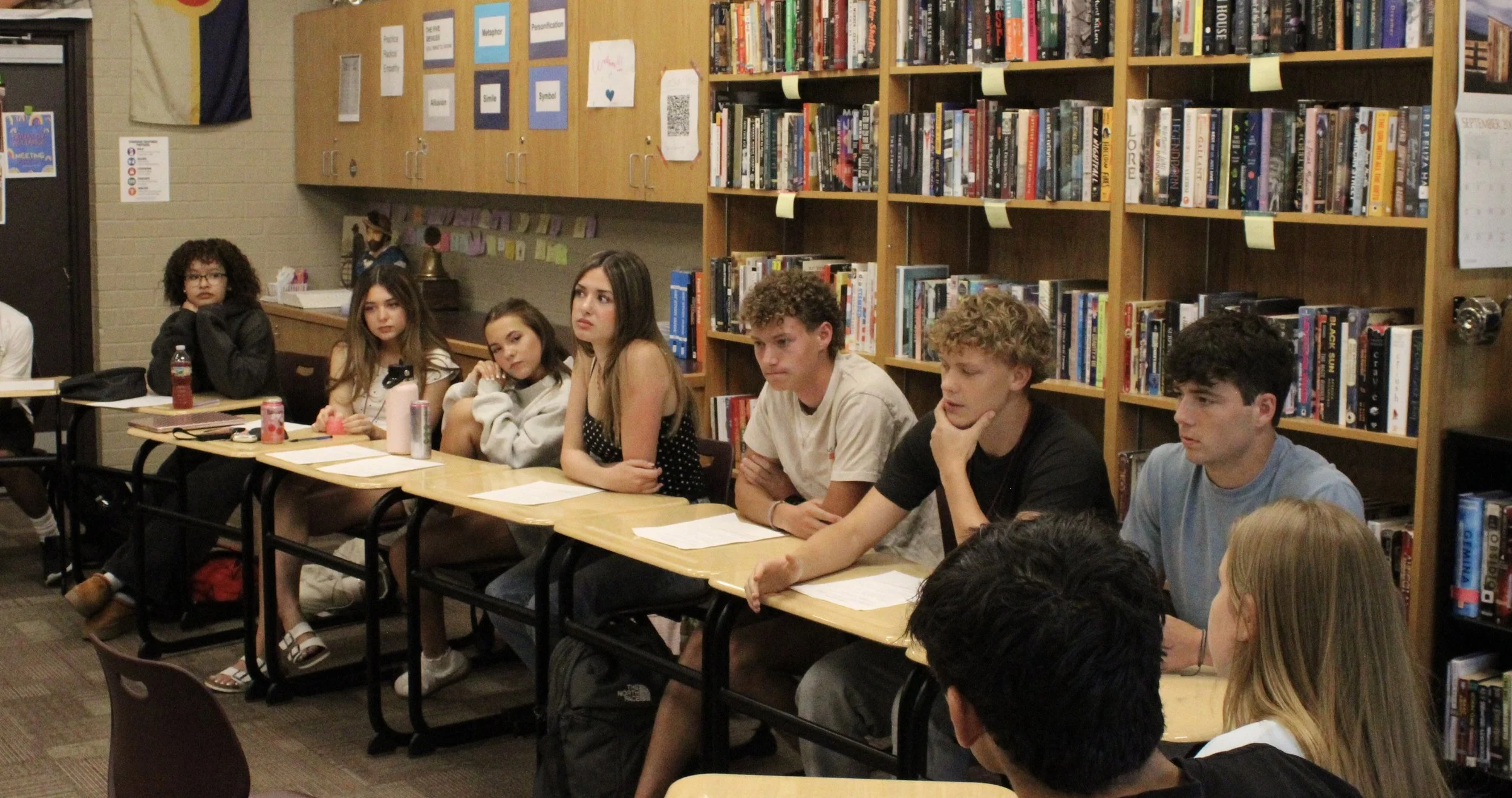 Students listen to a speaker