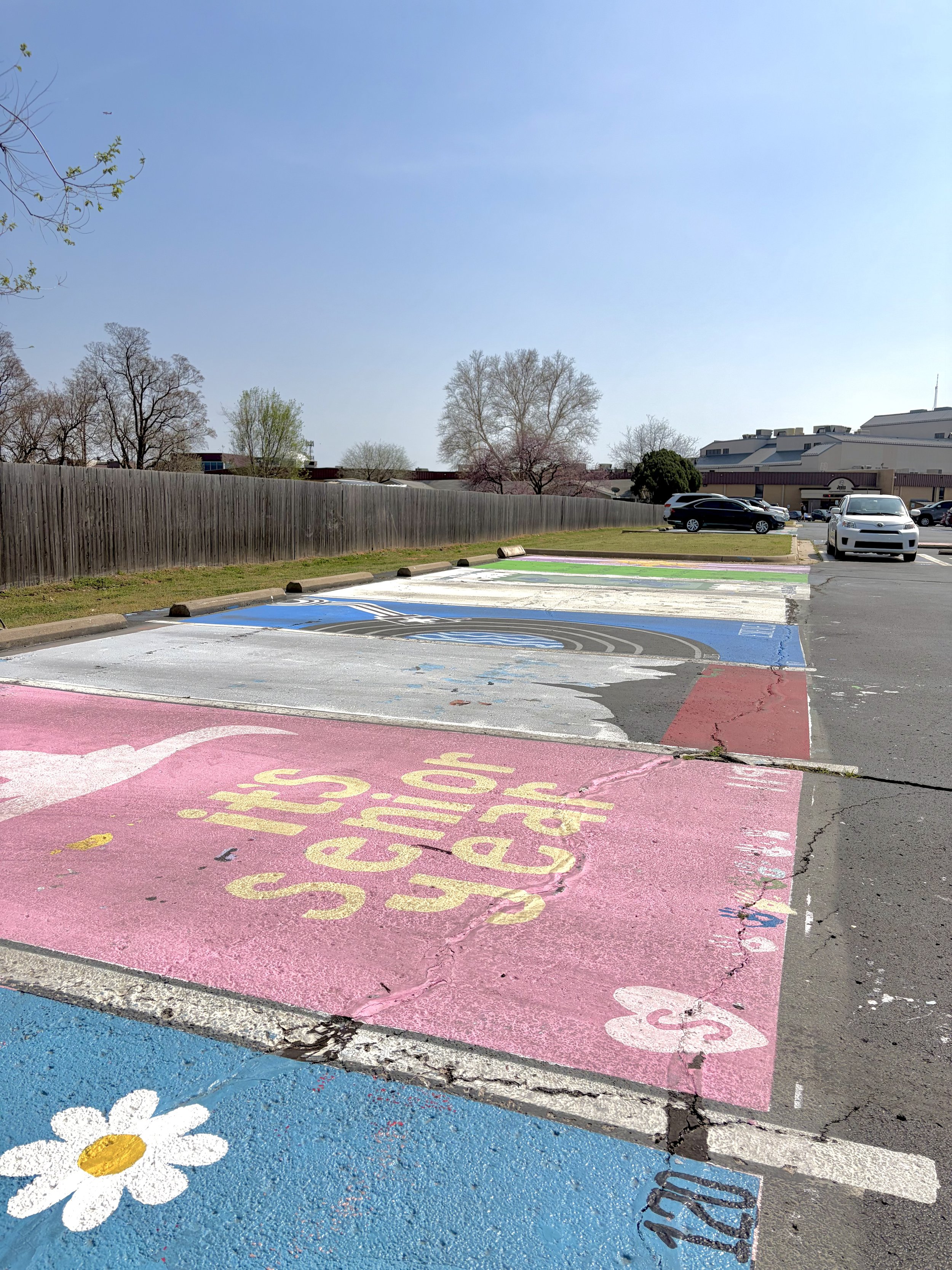 Alt: Empty parking lot during school day
