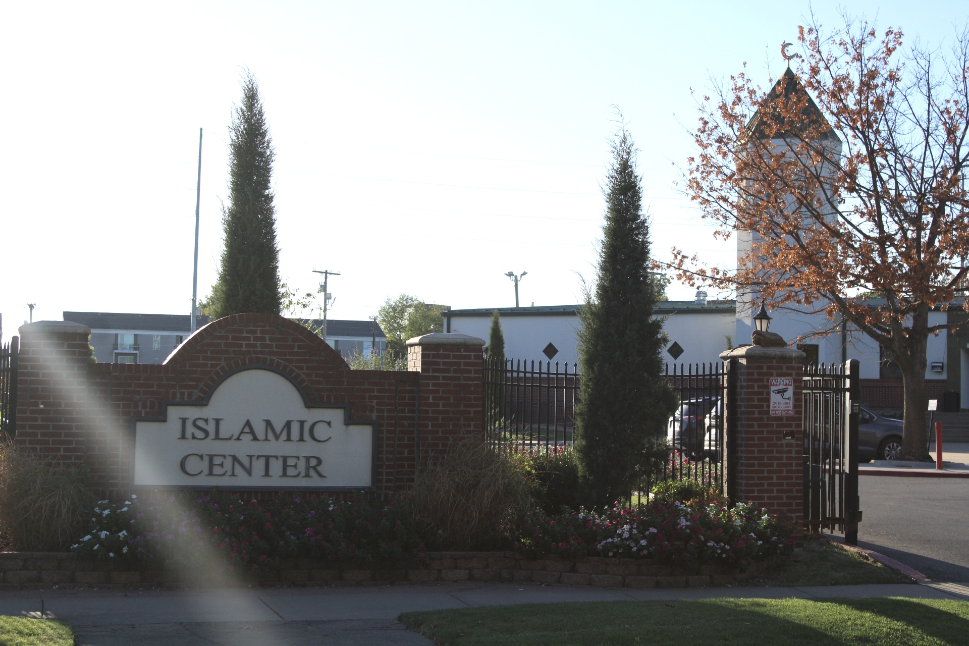Islamic Center front gates with mosque in background.
