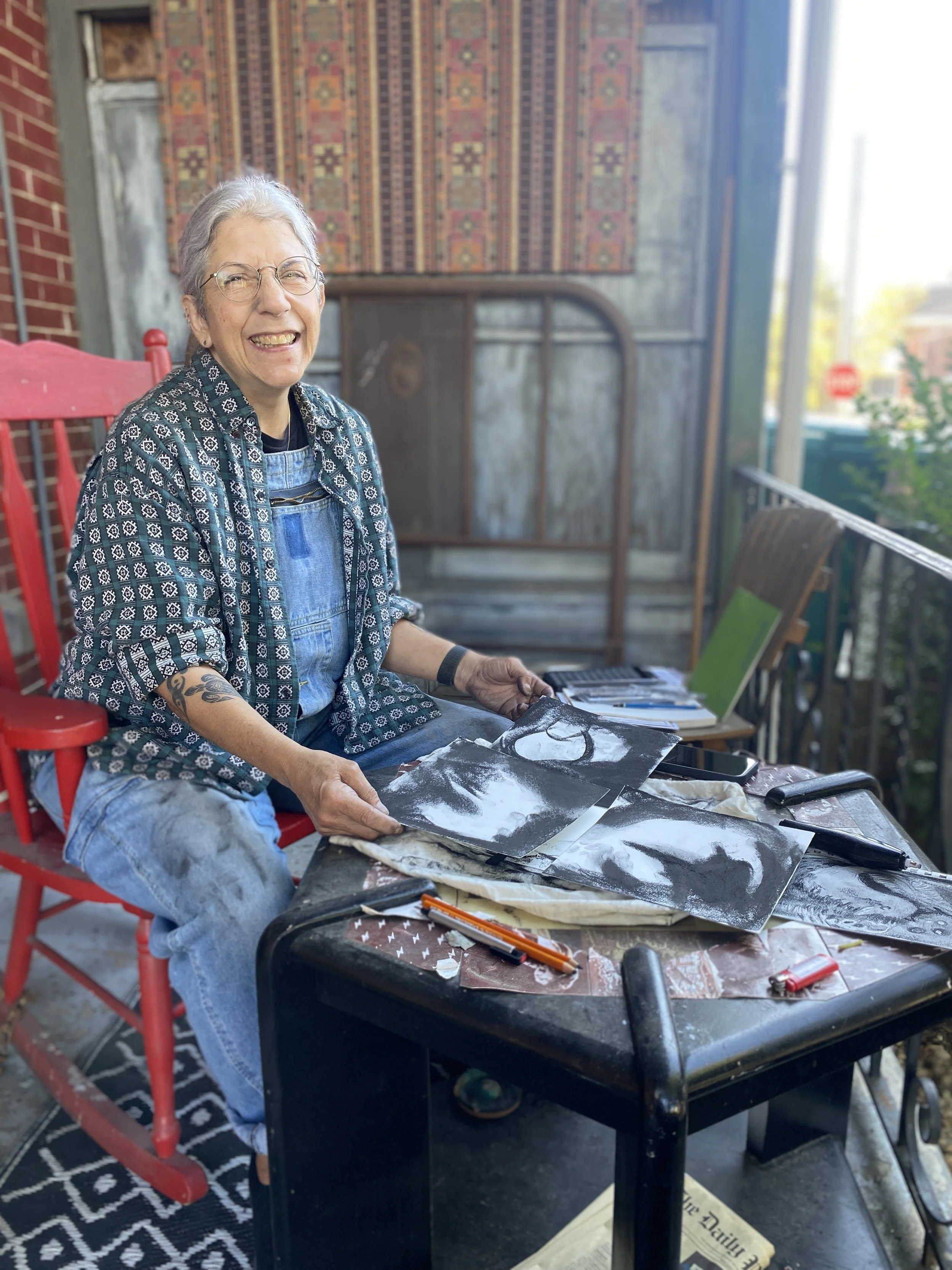 Nancy working on the front porch