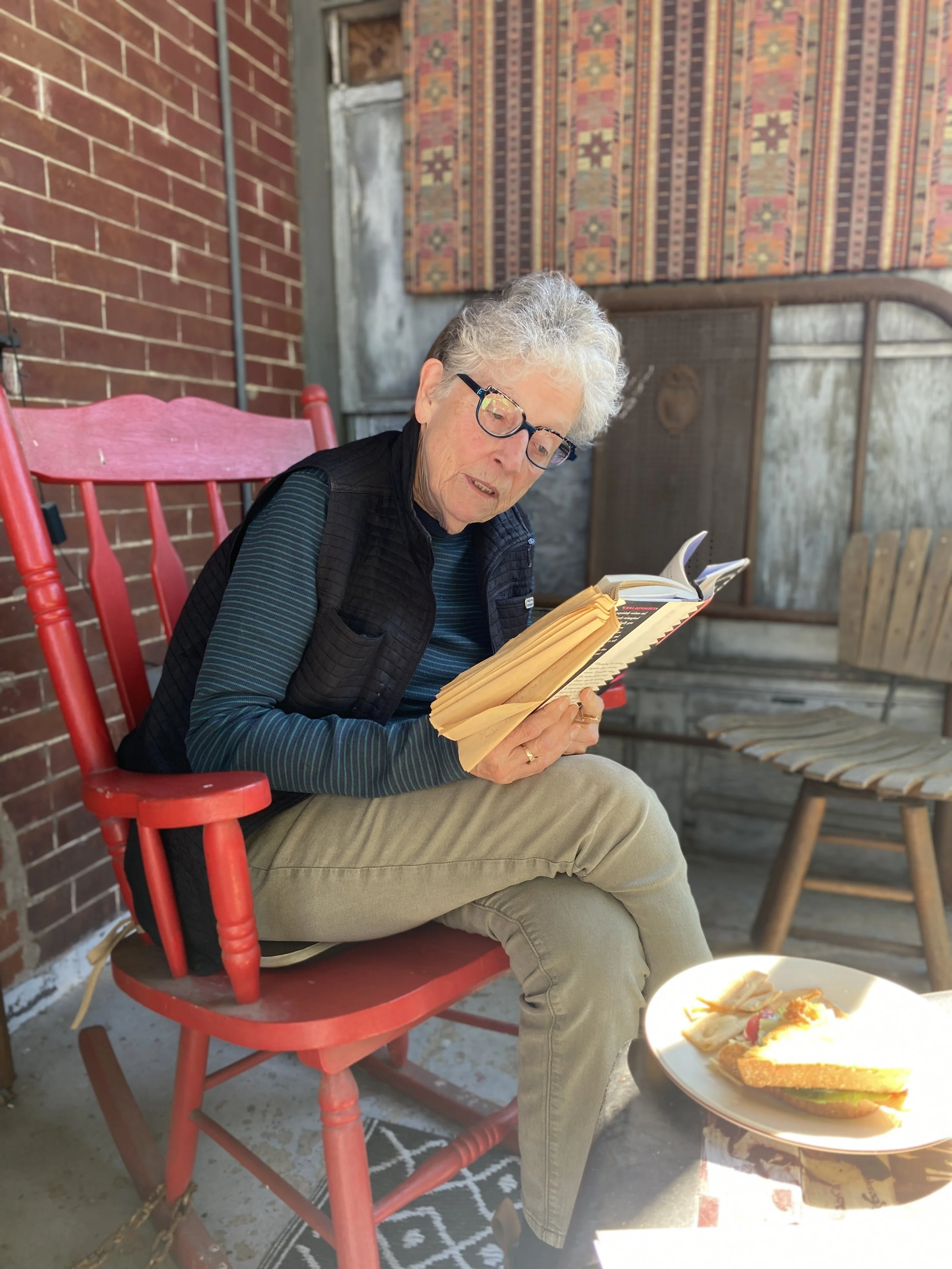 Kay working on the front porch