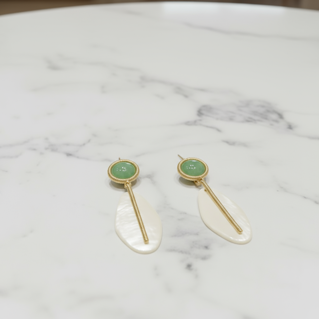 Firefly_Gemini Flash_make it more of a flat lay where we are looking down on the earrings 458408.png