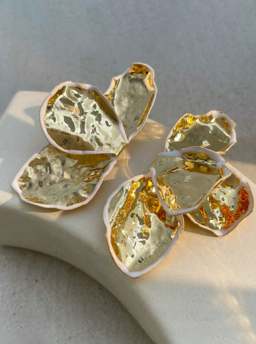 Metal petal earring with white enamel