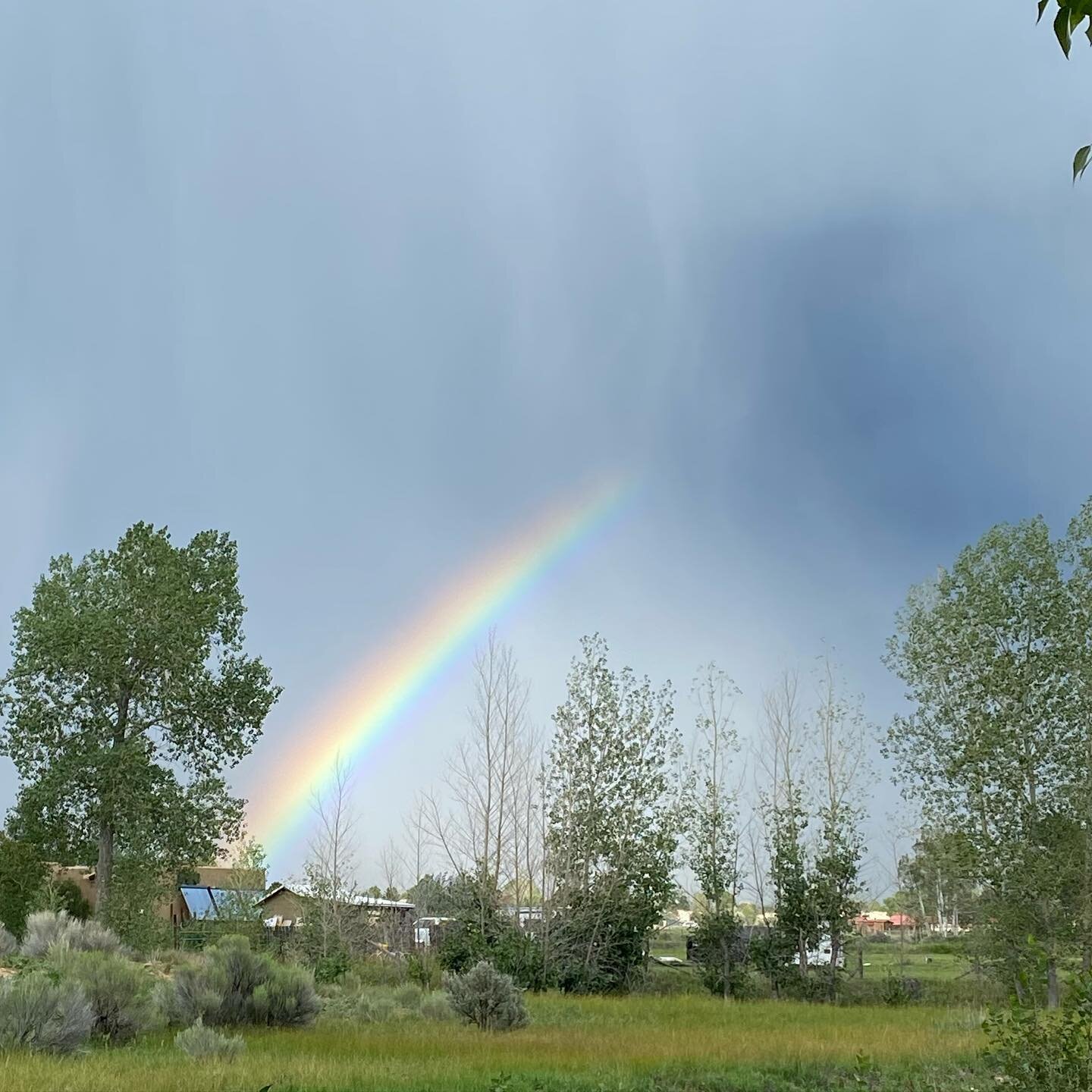 There isn&rsquo;t a filter to make a rainbow in a thunderstorm look more amazing. #taos #artbooks