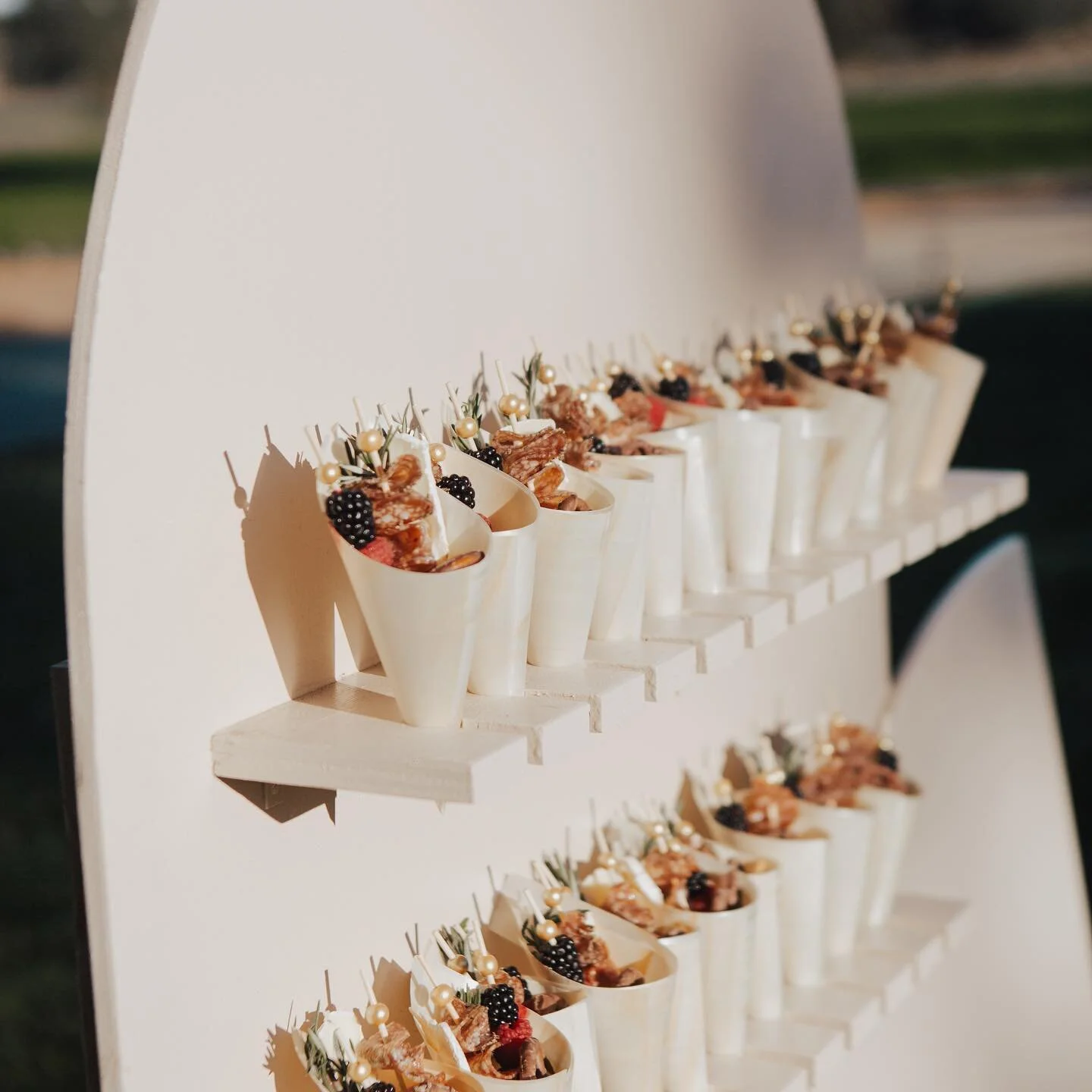 Obsessing over this beautiful wedding😍
.
We provided our charcuterie cones &amp; display for cocktail hour &amp; then churros ofcourse for the reception! Last our grid wall was a perfect addition for the cake cutting area!✨
.
Thank you so much for h