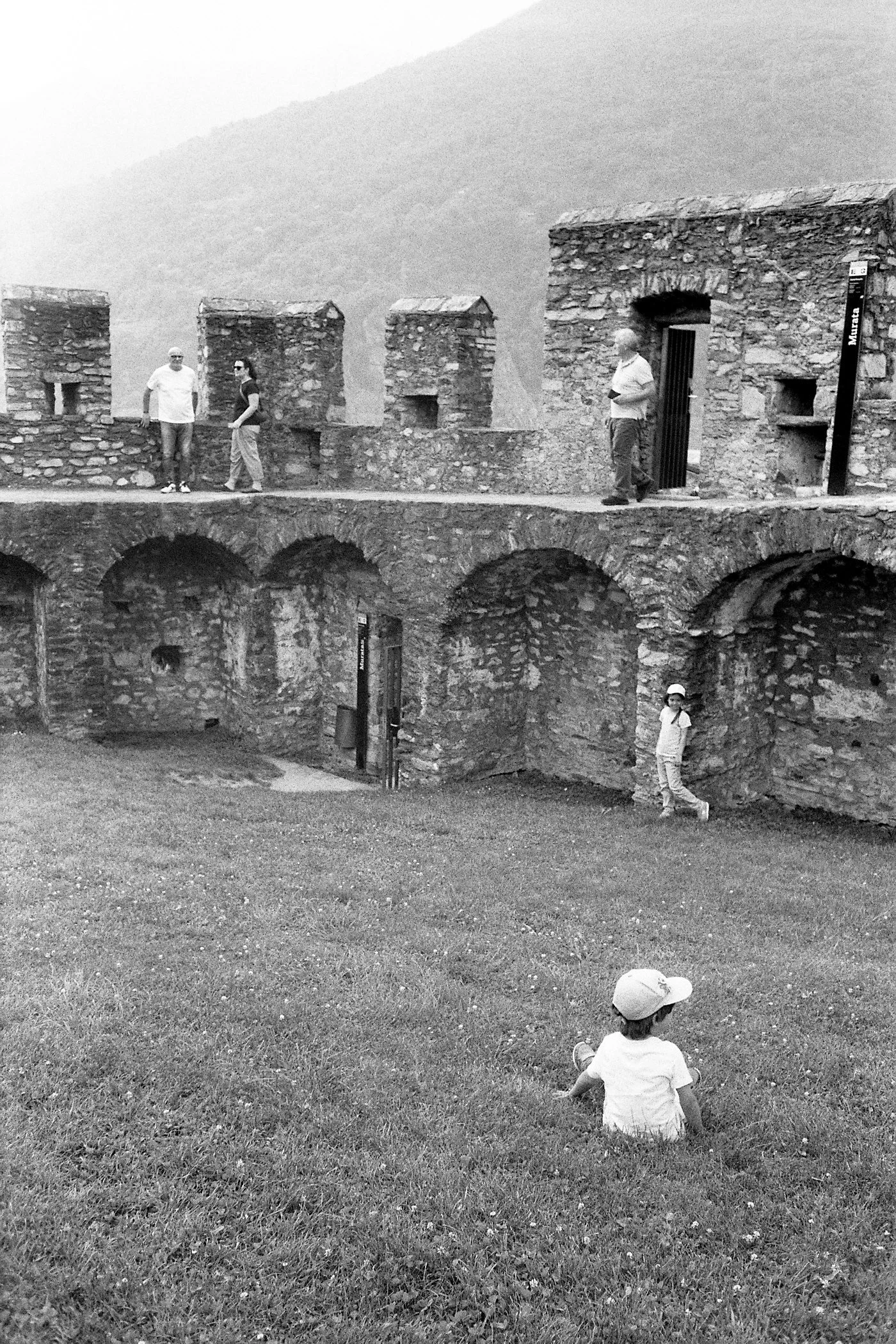 "old and young on the ruins of the castle in Bellinzona, Switzerland" 2024