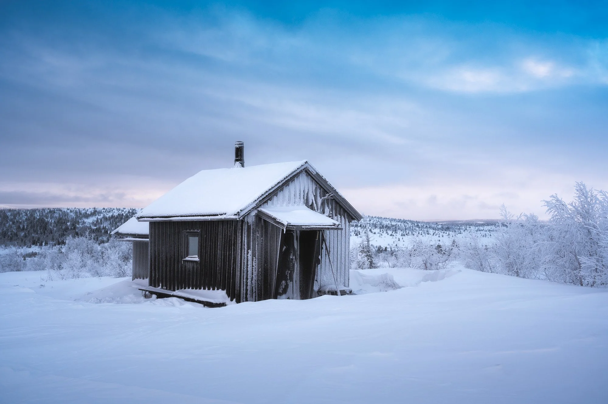 WINTER HIKING with skis for landscape PHOTOGRAPHY
