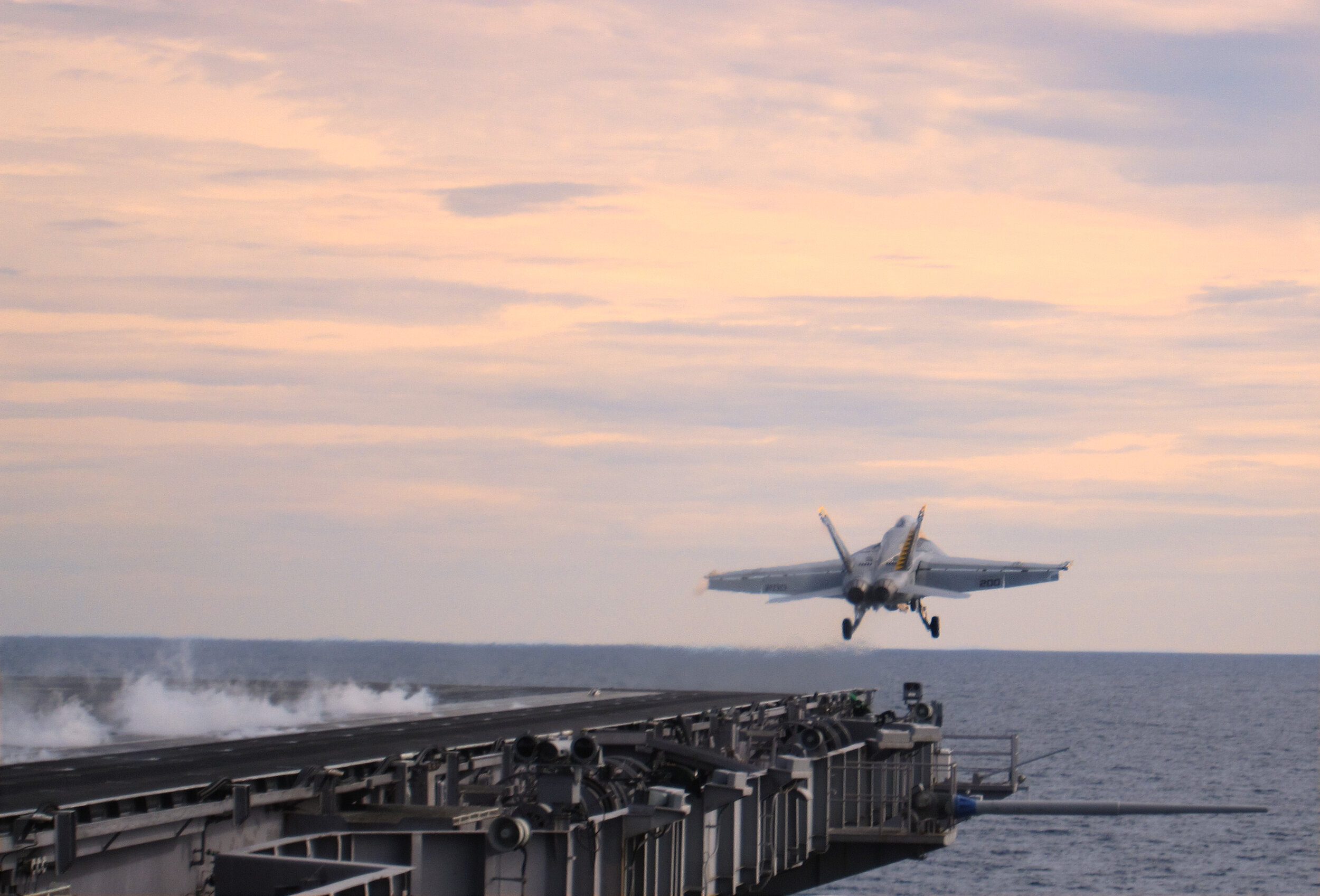 An F-18 Super Hornet takes off from the deck of the U.S.S. George Washington in the Gulf of Thailand.