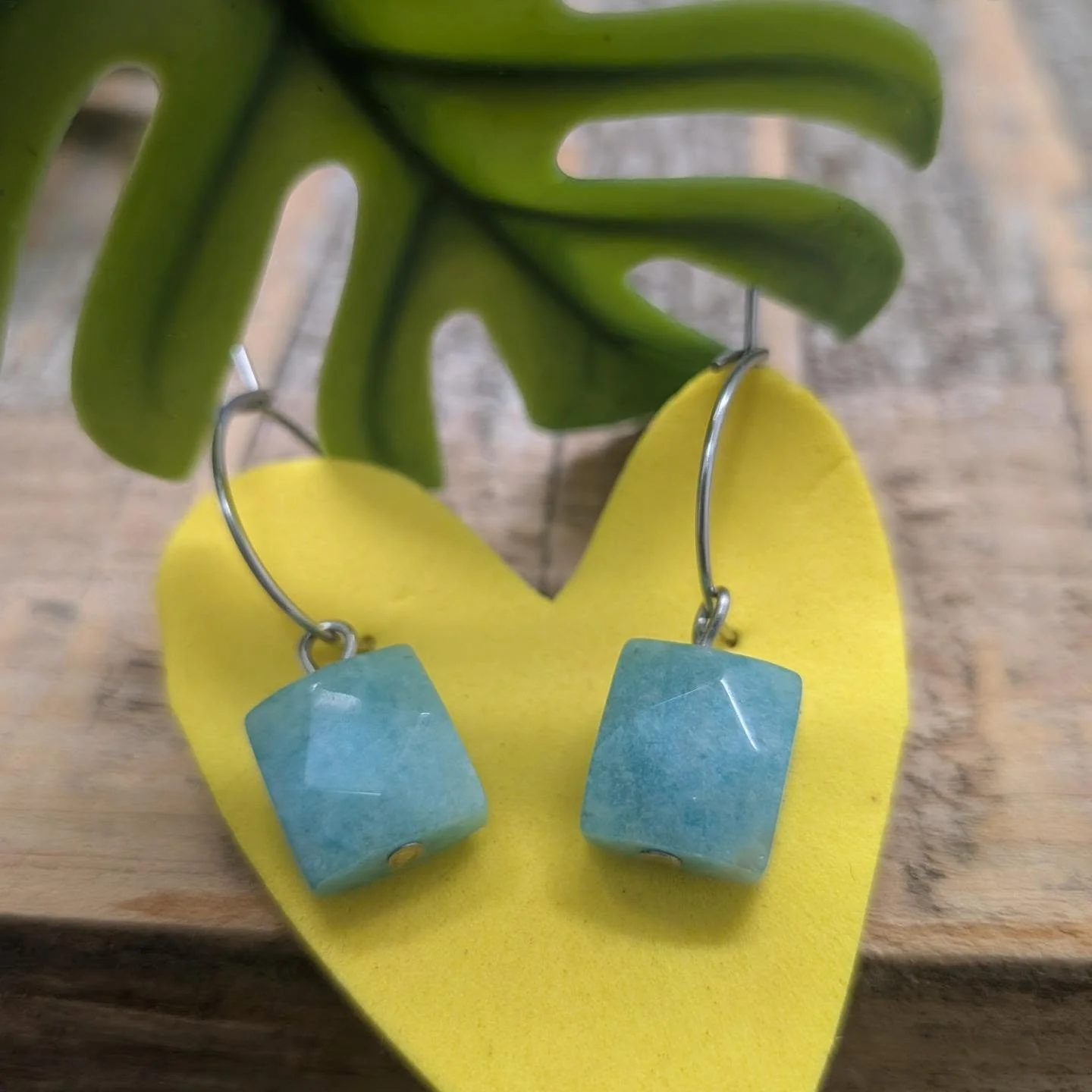 Water reminds me to go with the flow. To move with whatever life throws at us, instead of moving against it. 

These earrings contain amazonite gemstones, beautifully cut in a playful puffy square. 

Reminding you to go with the flow, and to stay pla