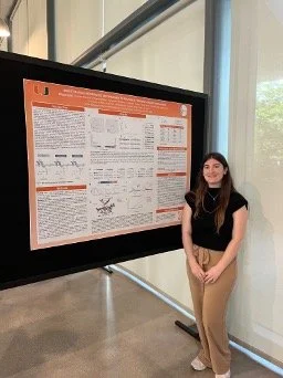 Alli presenting her poster at the Translational and Clinical Oncology annual symposium 2025