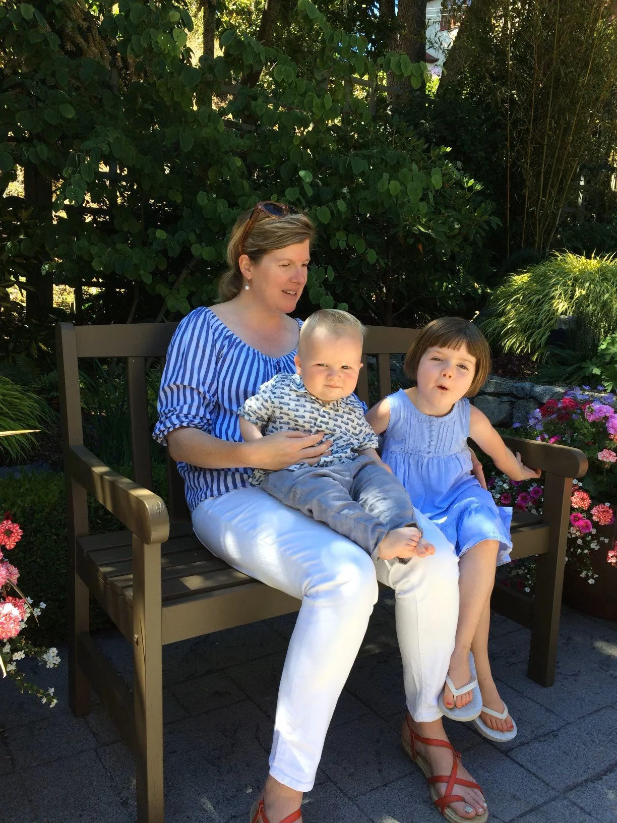 Mother with young children sitting outdoors in Squamish