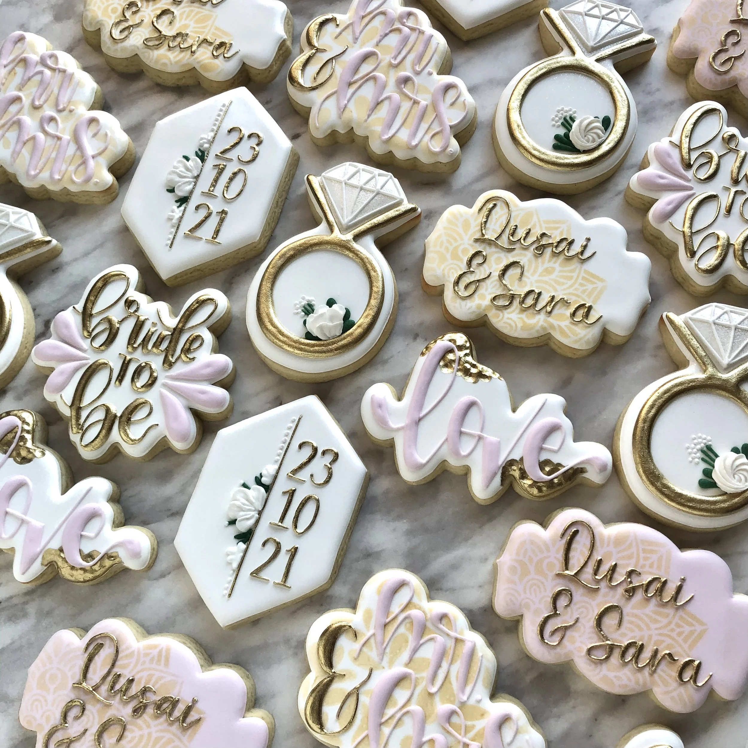 Custom wedding sugar cookies with floral designs made in Dartmouth Nova Scotia