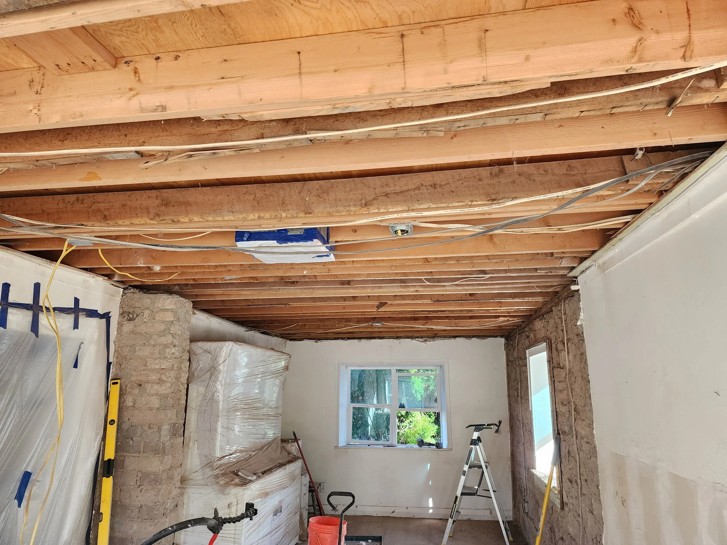 Our exposed beam ceiling in our pioneer home painted white — Em Hales Home
