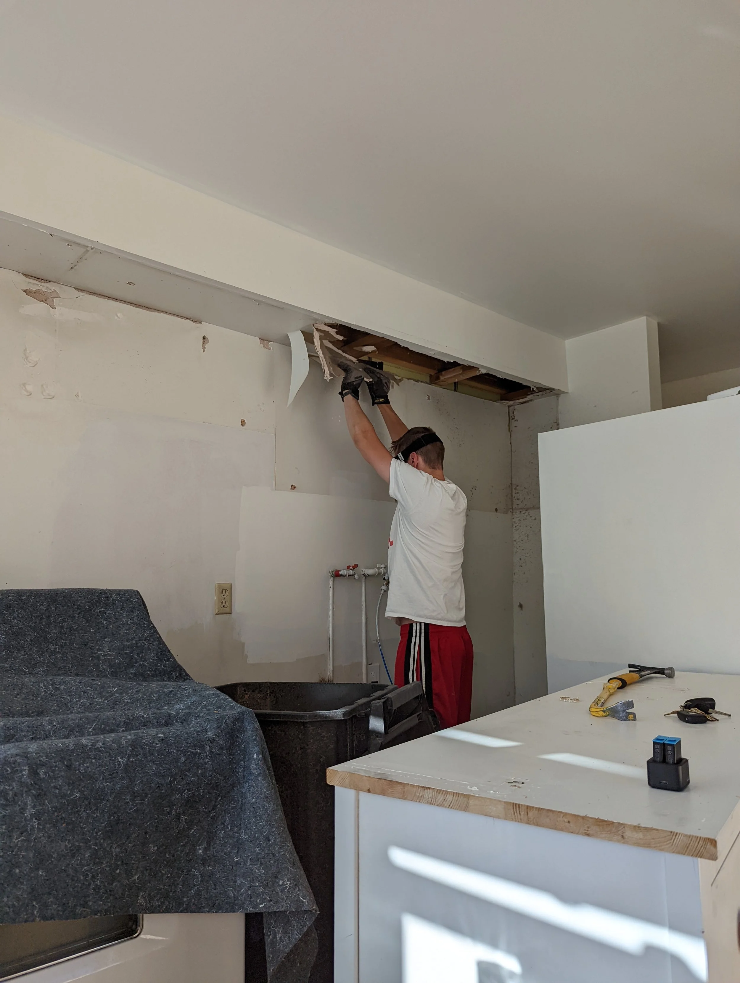 Our exposed beam ceiling in our pioneer home painted white — Em Hales Home