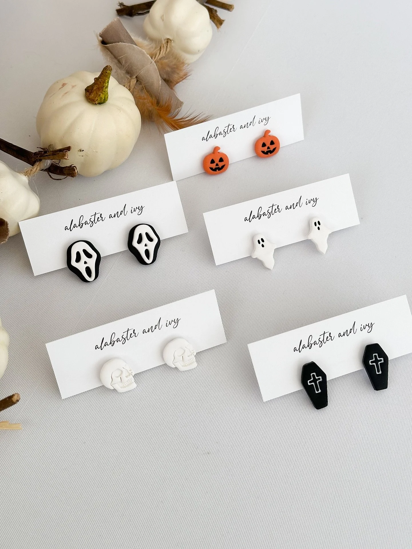 Studs for every {spooky} season. 💀🎃👻

Available today at the @downtown_salmon_arm_farmers market or tomorrow on my website! 

Hit the 🔔 to turn on your reminders! 

.
.
.
.
.
#alabasterandivy #halloween #spookyseason #halloweenvibes #polymerclaya