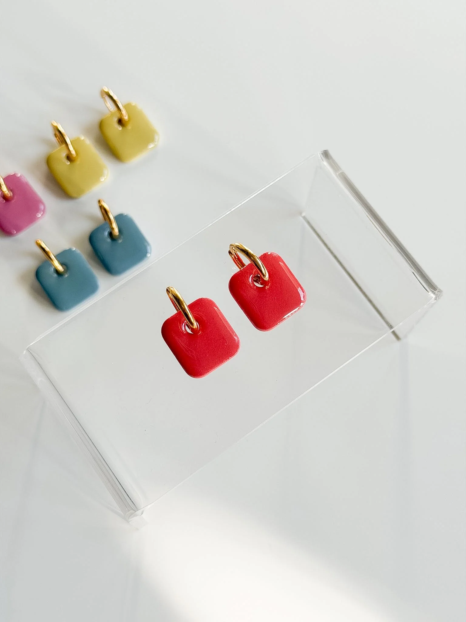 Bright Huggie Hoops - Coral.jpg